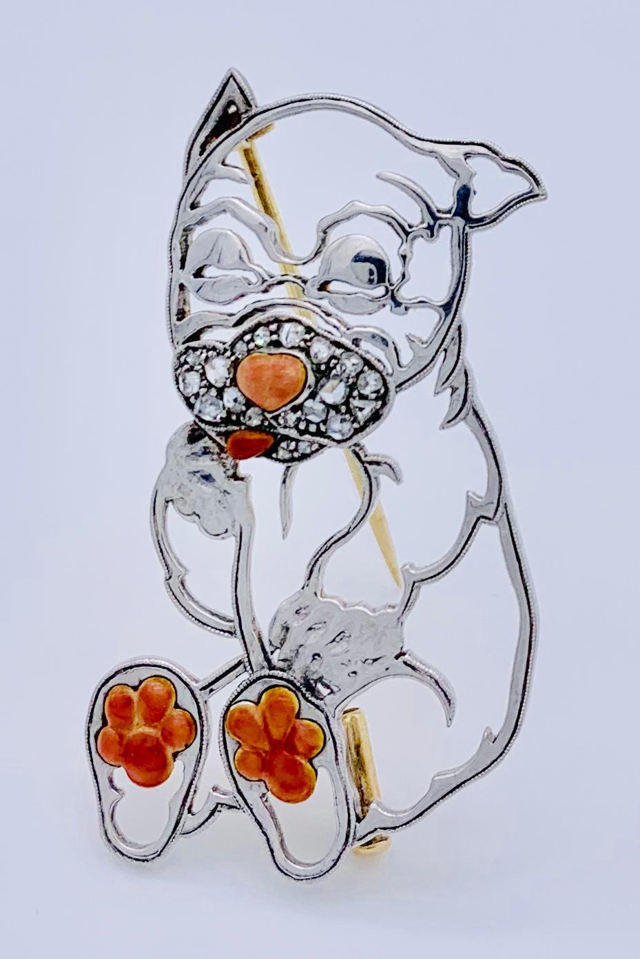 This charming baby bulldog is an exquisite example of Viennese goldsmithing. This outstanding and unusual brooch has been sawn out of 14 k white gold backed on 14 k yellow gold. It is finely chiselled, paws, tongue and nose are highlighted with
