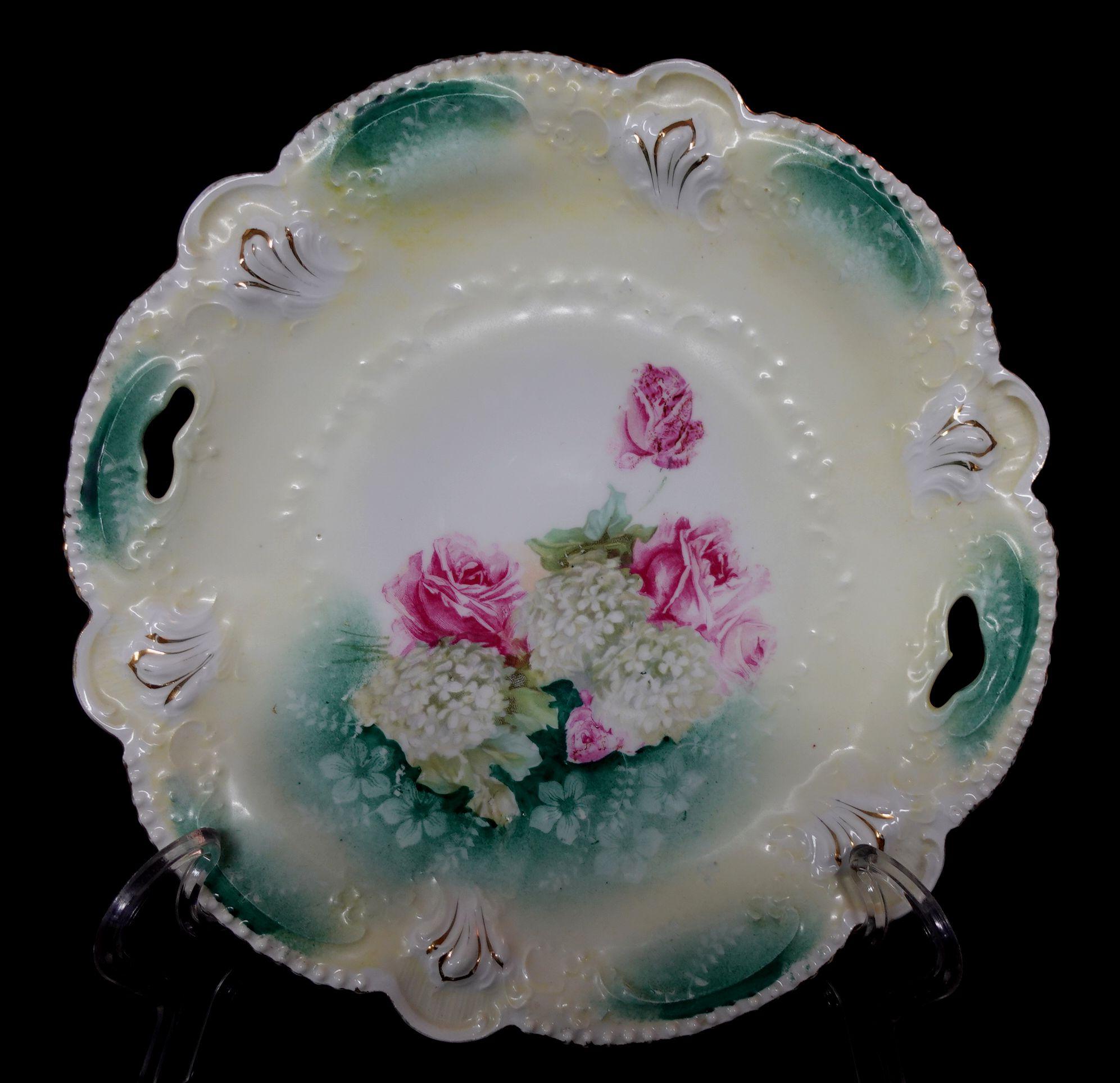 A wonderful antique RS Prussia cabinet plate hand painted roses gold trimmed porcelain plate.
   