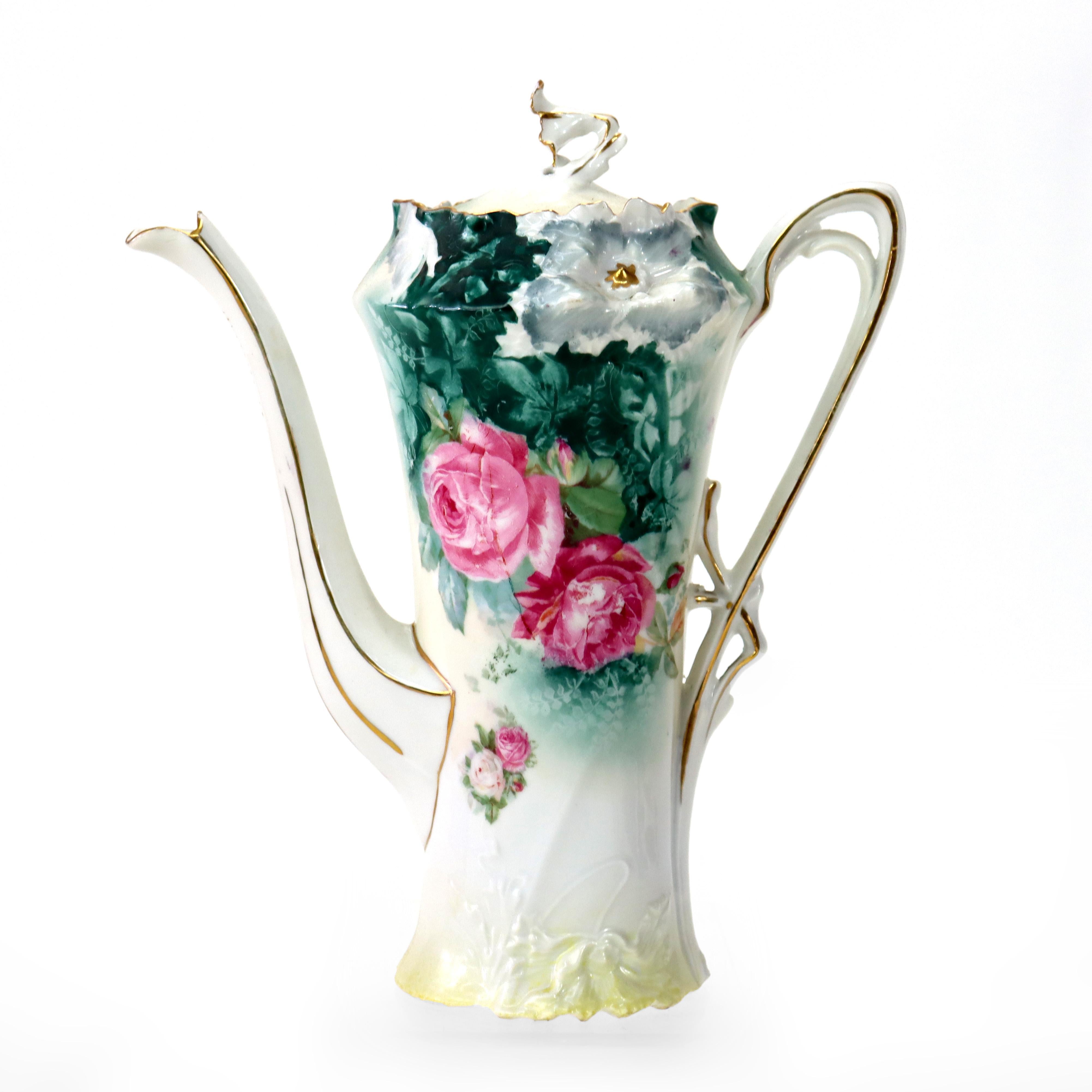 Ancienne chocolatière en porcelaine de RS Prussia avec 5 tasses à demitasse signée C1920
Pichet 8 1/8