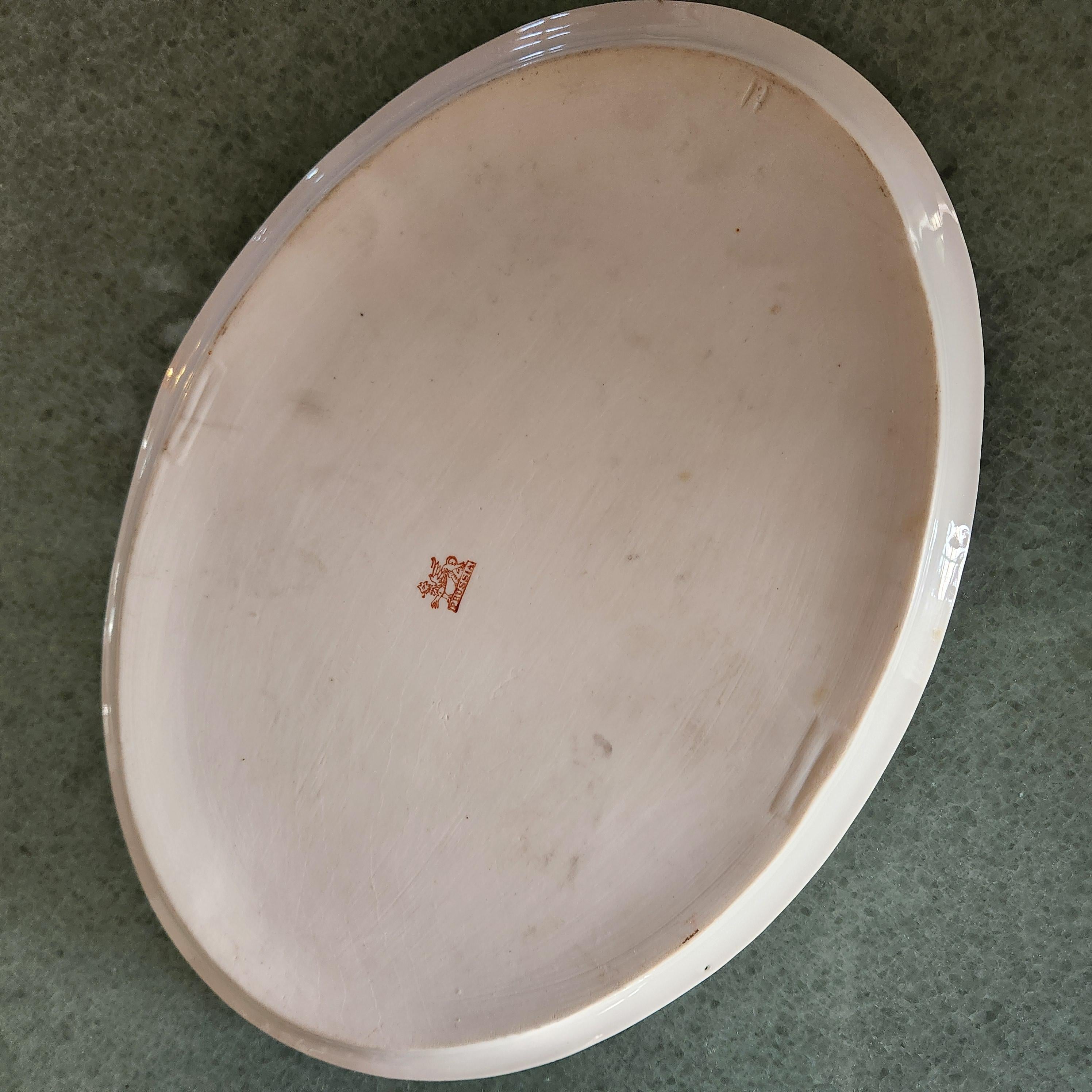 Antiguo plato rosa pintado a mano RS Prussia Reinhold Schlegelmilch Porcelana en venta