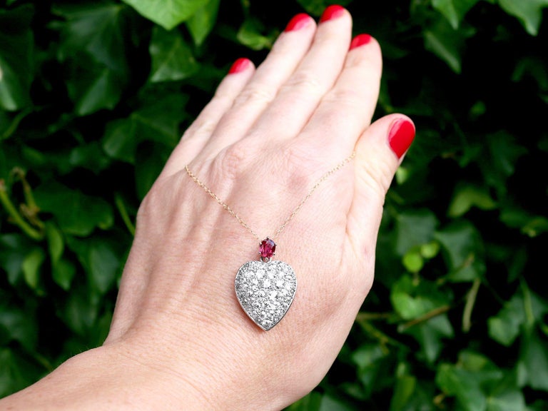 A stunning, fine and impressive antique Victorian 0.60 carat ruby, 3.16 carat diamond and 12 karat rose gold, platinum set heart shaped pendant; part of our diverse antique jewellery and estate jewelry collections.

This stunning, fine and