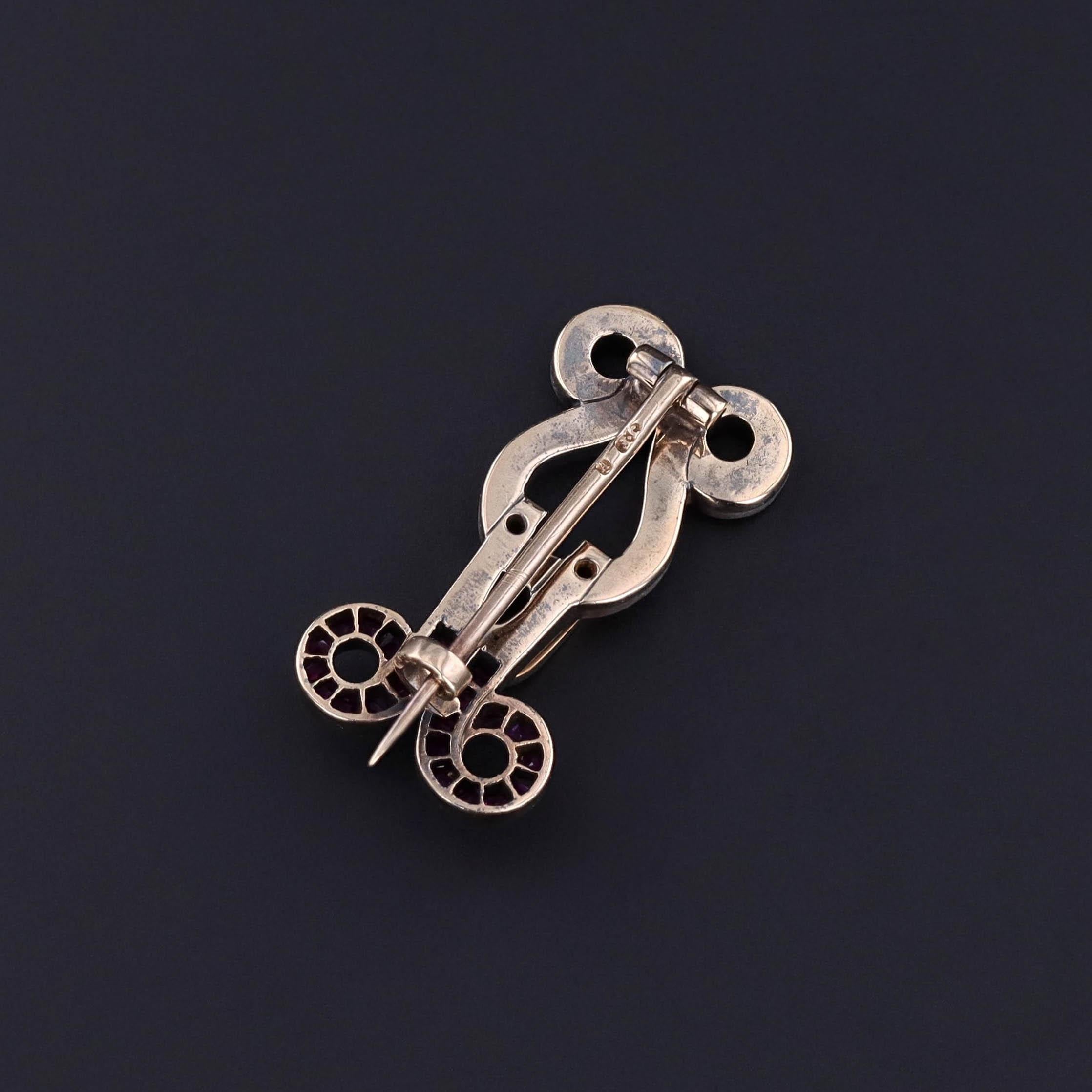 Round Cut Antique Ruby and Diamond Brooch of 12ct Gold For Sale