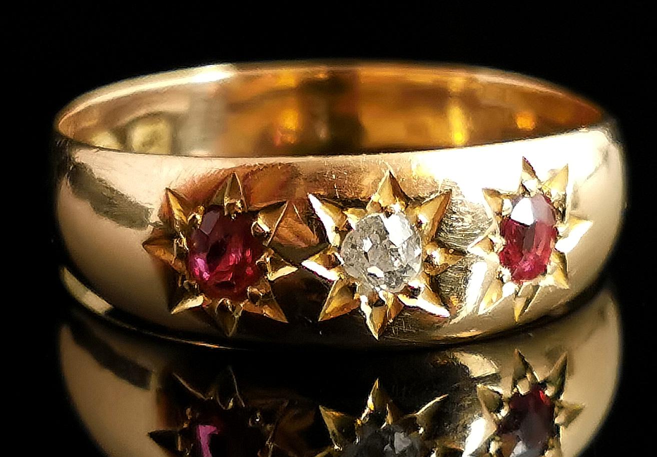 An impeccable antique 18 karat yellow gold, Ruby and Diamond gypsy set ring.

A very high quality and well made antique ring and a true must have style with the beautiful star like gypsy setting.

It has a wide substantial, rich 18 karat yellow gold