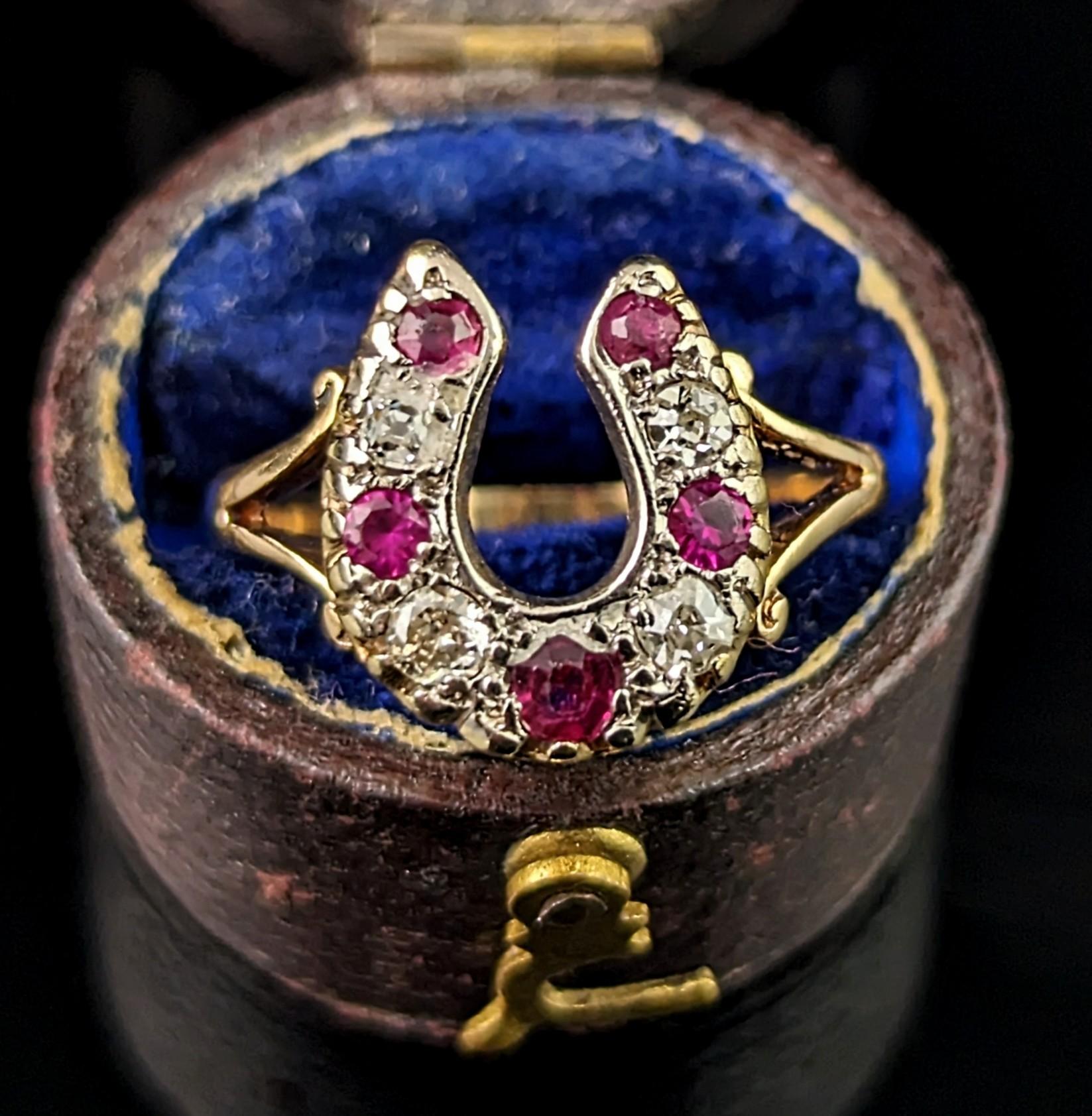 Nothing quite compares to the whimsical symbolism of the horseshoe and this antique Ruby and Diamond horseshoe ring is the perfect piece to add a dash of good luck to your jewelry collection.

Crafted in rich, buttery 18ct gold it has slender