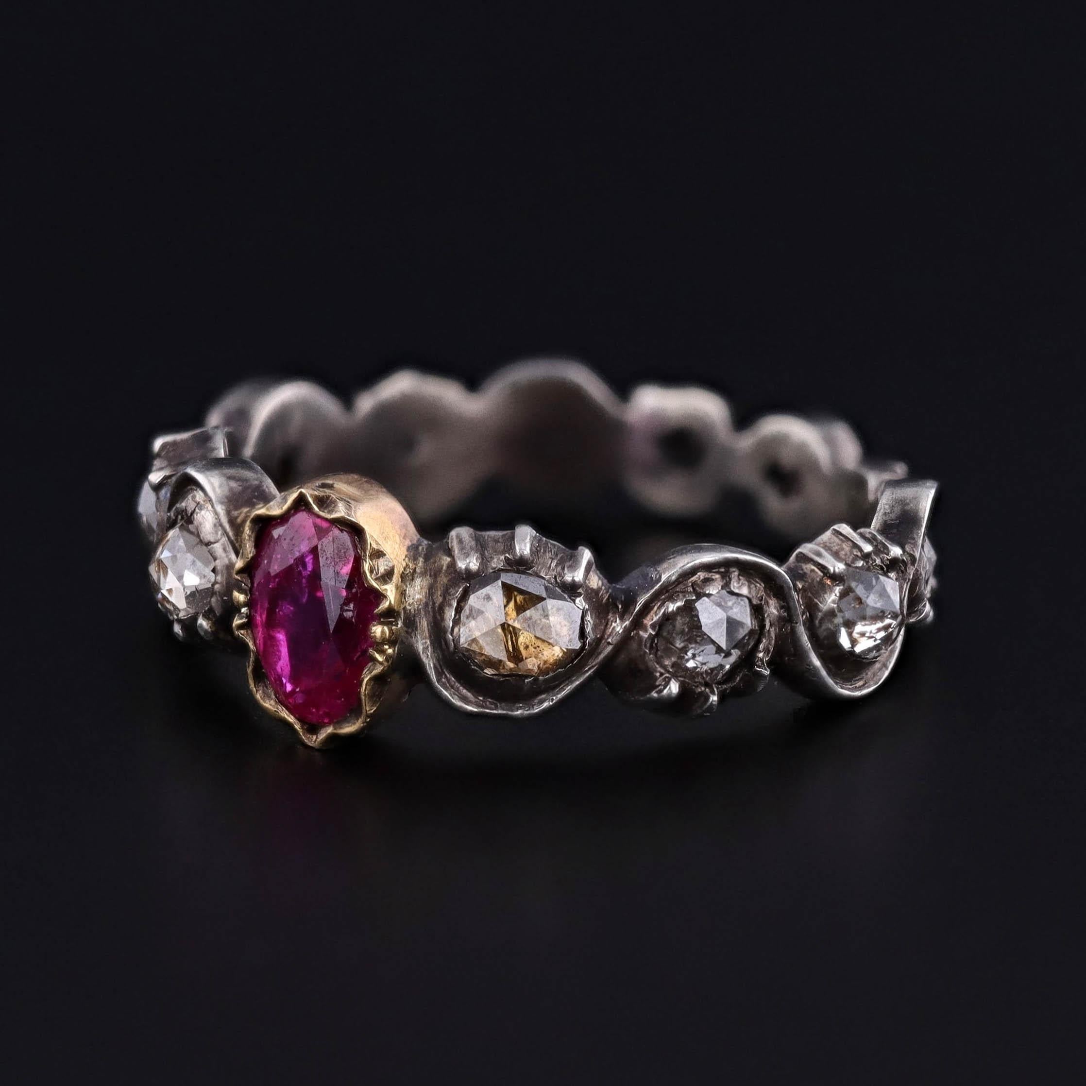 Victorian Ruby & Diamond Ring, Circa 1890

A romantic jewel from the late Victorian era, this antique ring showcases a vivid natural ruby, elegantly set in rich 14k gold. The band is crafted from 850 silver and is delicately accented with glittering