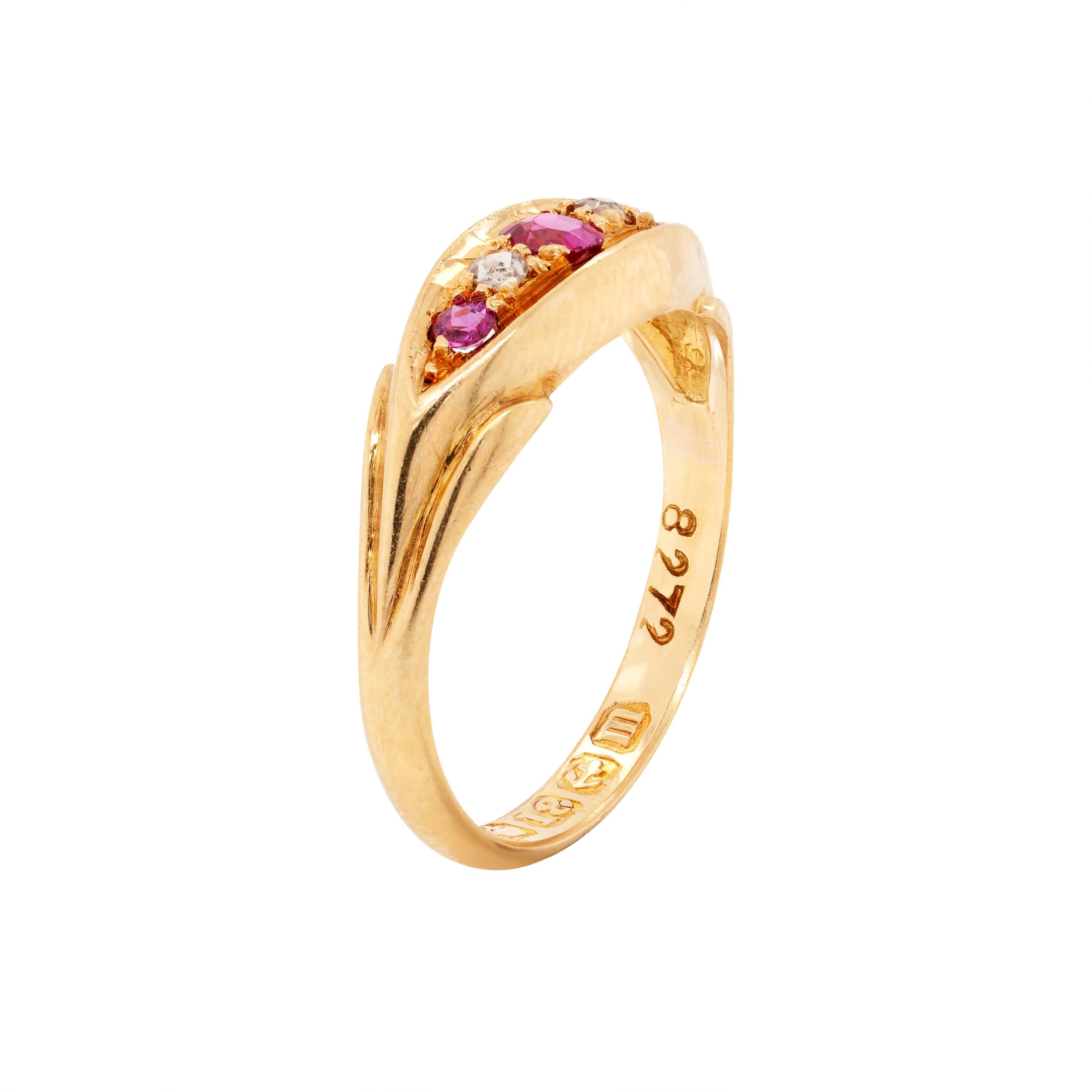 This beautiful ring features 3 round rubies accompanied by two old cut diamonds all mounted in a classic original Edwardian 18 carat yellow gold setting.  English hallmarks- 1911. UK finger size 'J1/2'.