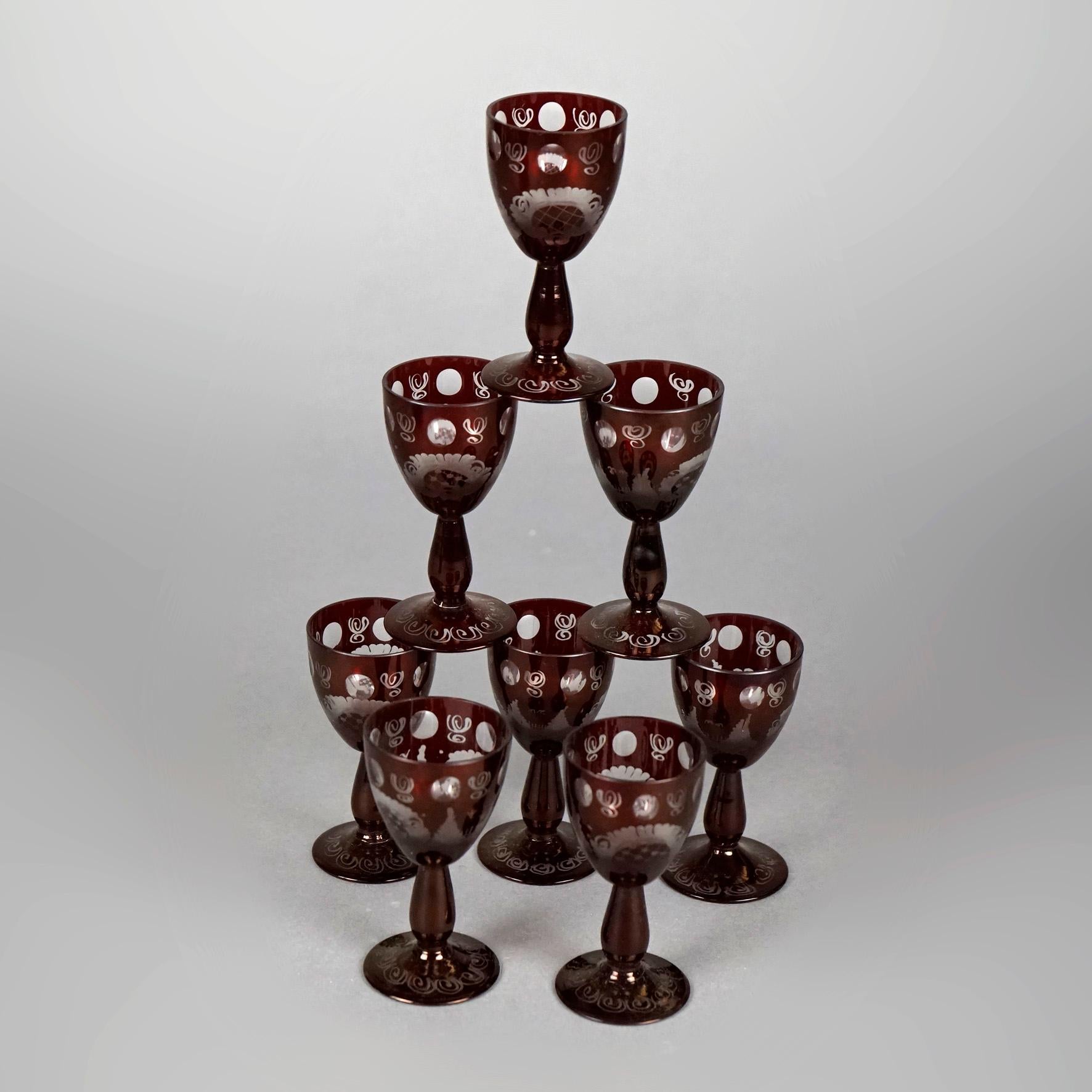 An antique liquor set offers decanter and cordials in ruby glass cut to clear with scenic design, c1930

Measures- Decanter 11.75''H x 5.75''W x 5.75''D; Cordials 3.5''H x 1.75''W x 1.75''D

Catalogue Note: Ask about DISCOUNTED DELIVERY RATES