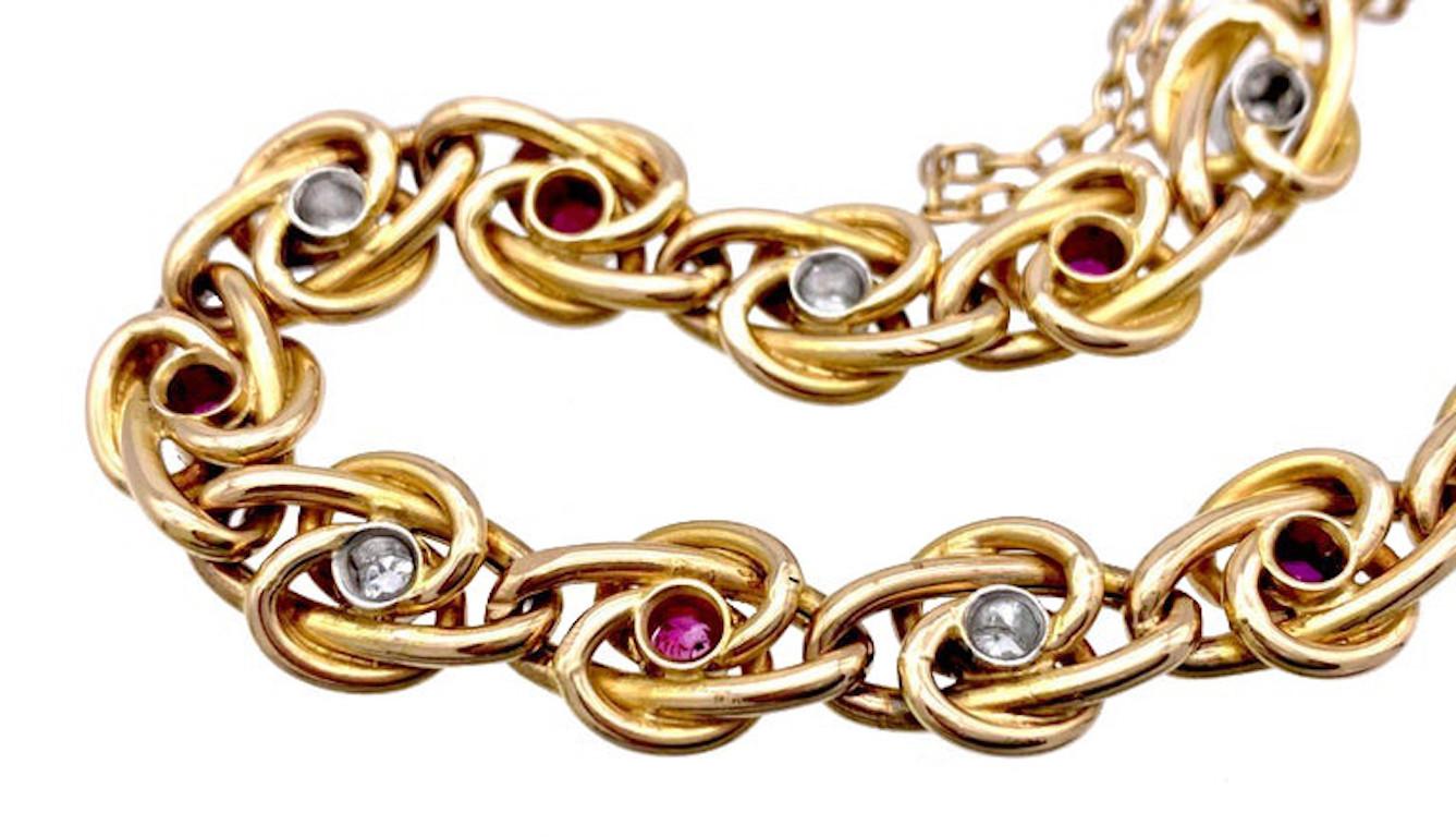 Belle Époque Antique 18 Karat Gold Link Bracelet Ruby Diamond Platinum French Eternity Knots  For Sale