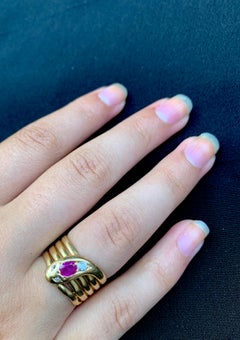 Bague serpent enroulé en or jaune 18 carats avec rubis et diamants, début du 20e siècle