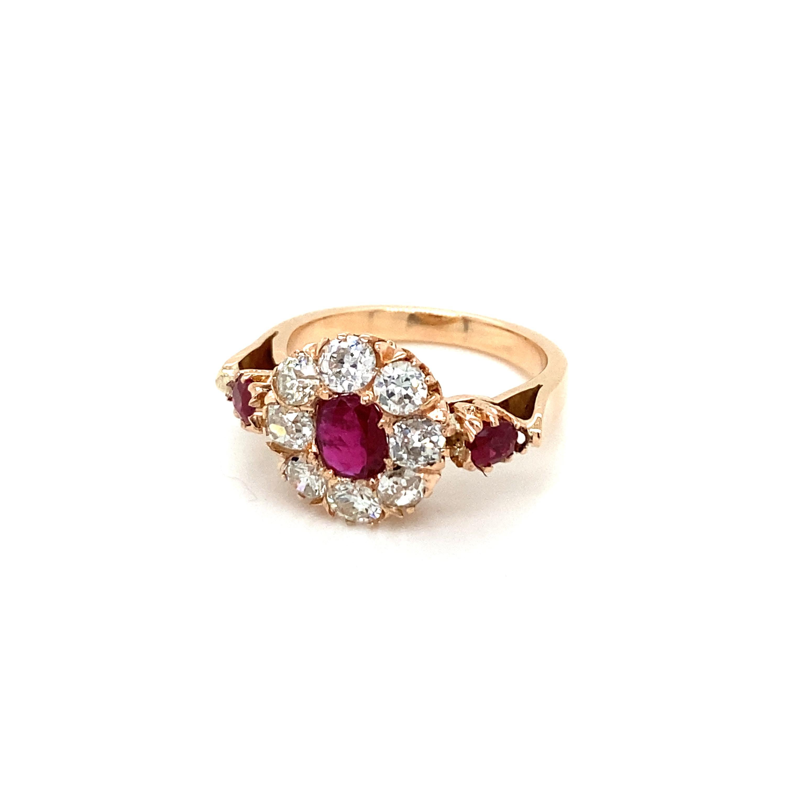 Beautiful 1800' engagement ring.
It features in the center a large Natural Burmese Ruby weight 0,50 carat, surrounded by an halo of sparkling Old mine cut Diamond weighing 1.35 carats, graded H/I color Vs clarity, and enriched by two smaller rubies