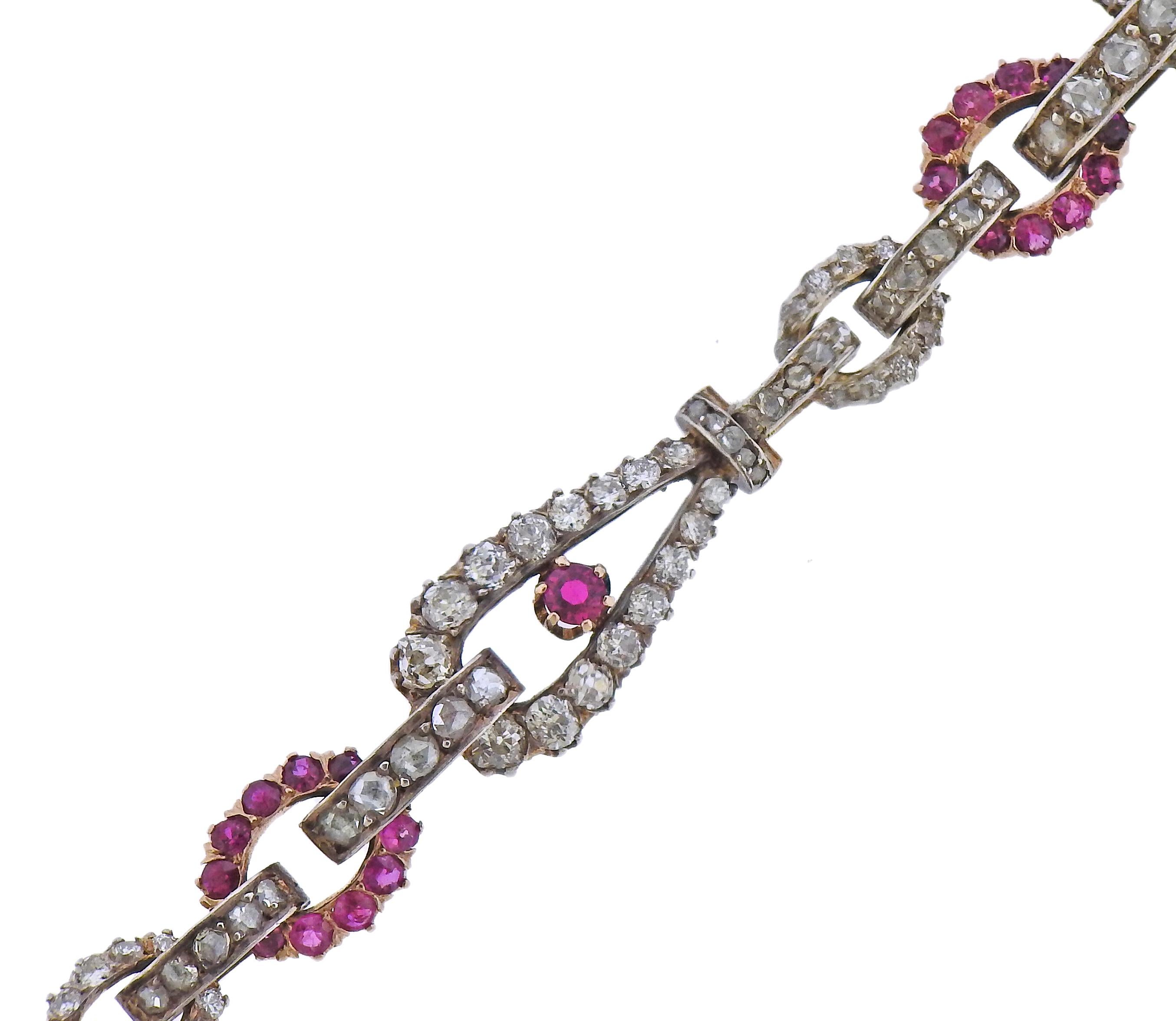 Antique 14k gold bracelet with rubies and a combination of old mine and rose cut diamonds. Bracelet is 6.5' long (chain is not original/antique). Bracelet is 10mm wide. Weight - 11.6 grams. 