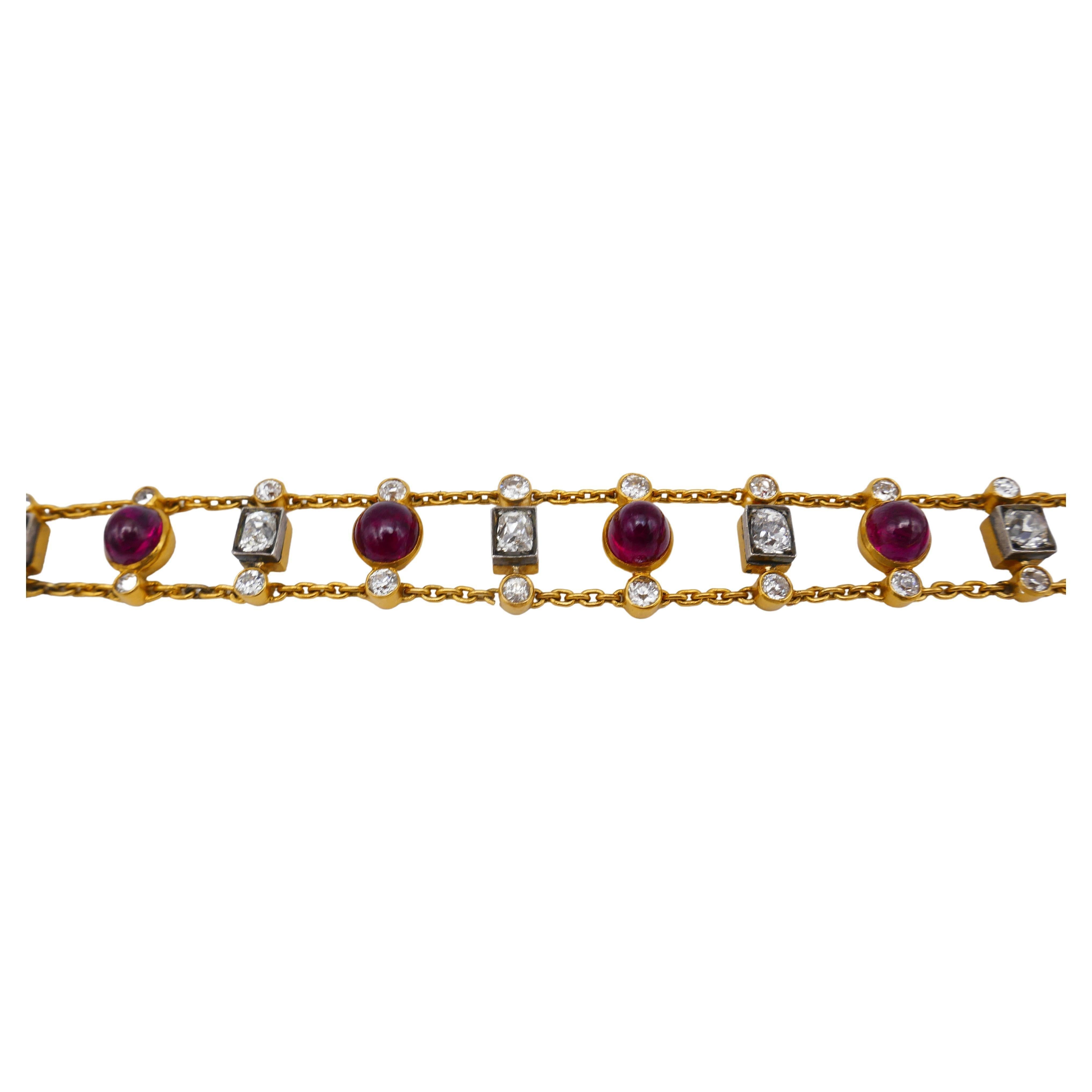 A delicate Antique 18k (tested) gold chain bracelet features ruby and diamond.
Diamonds set in silver and gold setting. There are 2.19 carat and 1.16 cts of Old Mine cut diamonds. Rubies are oval cabochon, 11.15 carats in total. 
Equipped with a