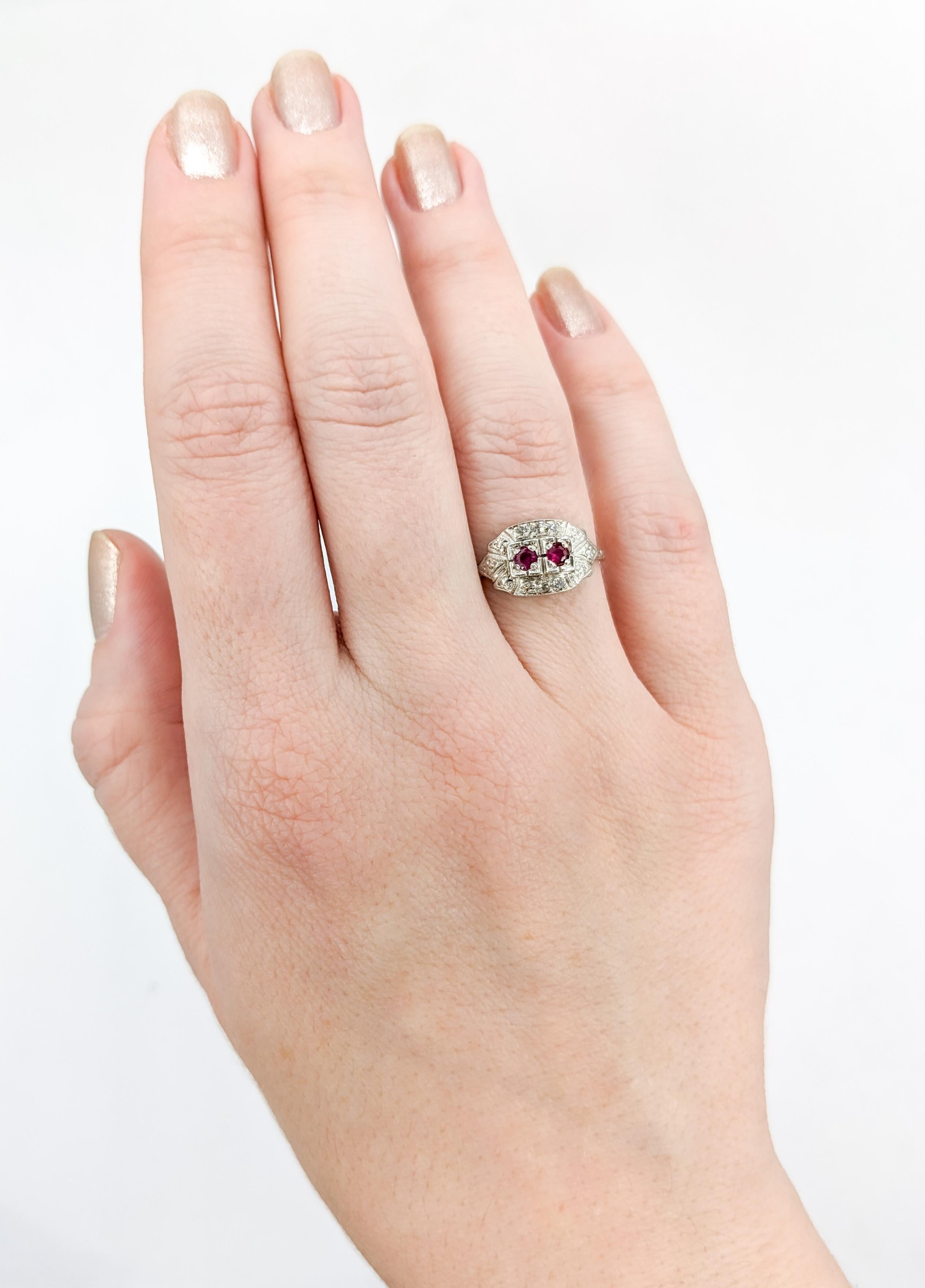 Dreamy Antique Ruby & Diamond Ring in Platinum

Discover the allure of bygone eras with our enchanting Antique Ruby Ring. Beautifully fashioned in platinum, This ring boasts a graceful pair of Rubies totaling .20ctw. In addition to the vibrant