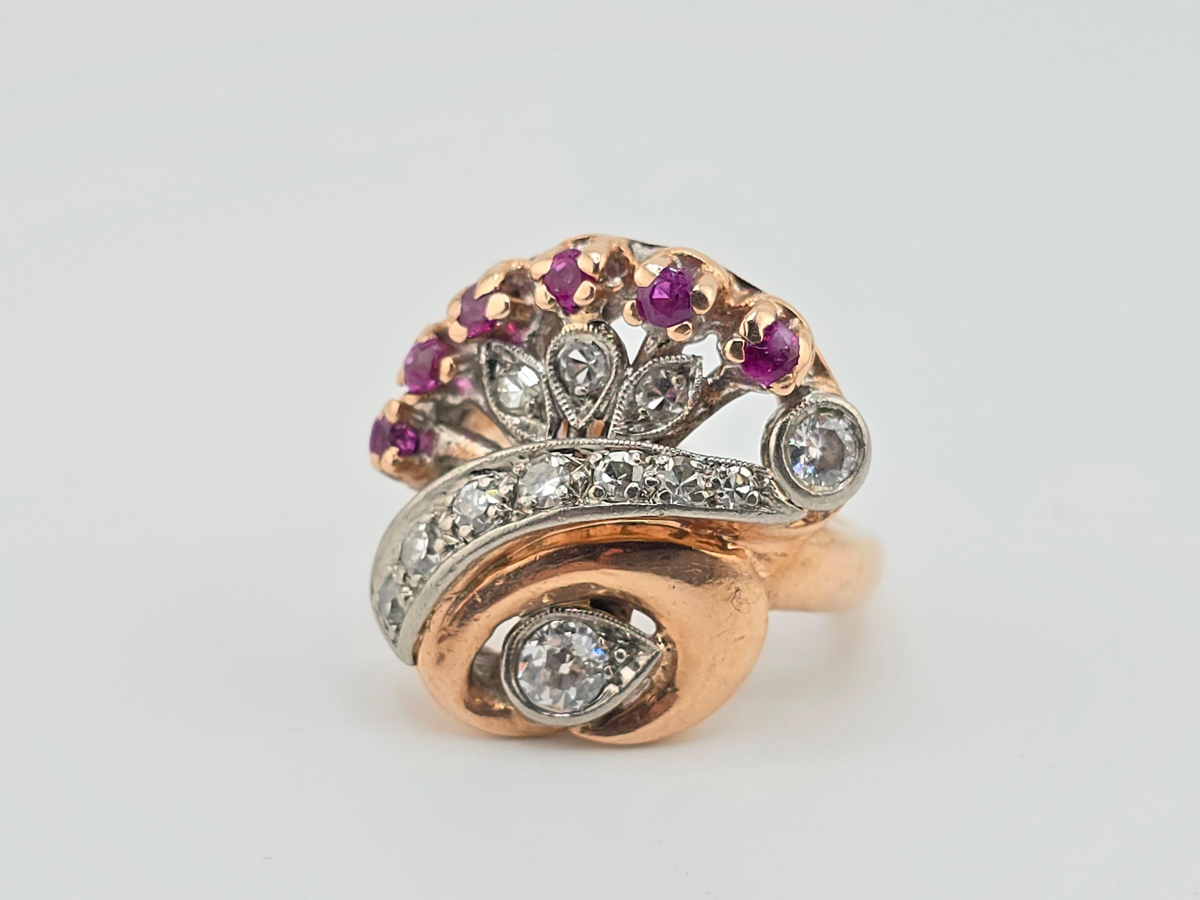 This is a gorgeous 14 karat rose gold, diamond and Ruby ring. It is an antique ring most likely made in the Victorian era. it has old mine cuts both for the diamonds and the rubies. The total carat weight is approximately less than .20 carats for