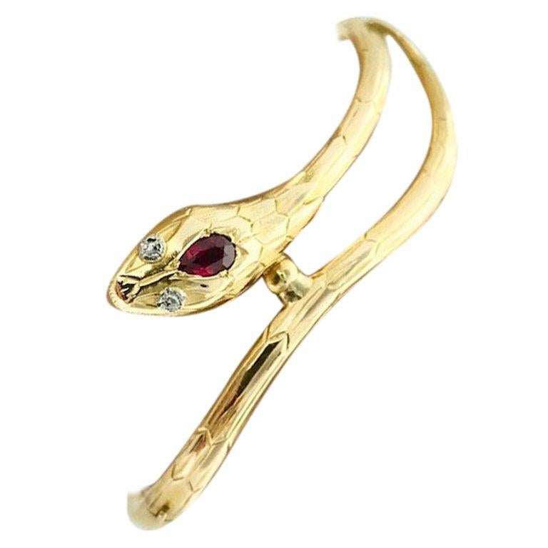 Antique Ruby and Diamond Rose cut Yellow Gold Snake Bangle Bracelet.
Early 20th Century.
Simple, Elegant and Delicate. 