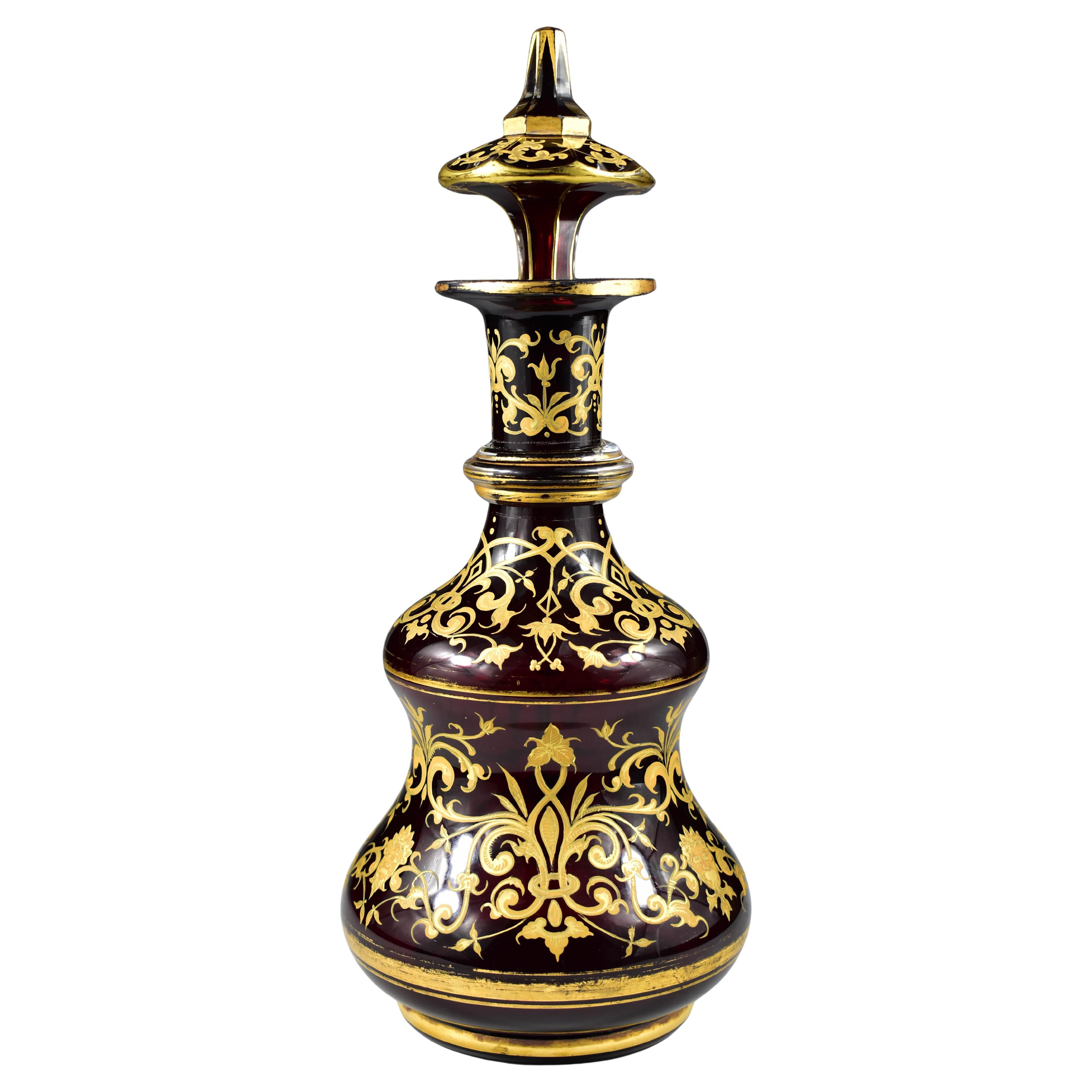 Antico decanter in vetro rubino dipinto e dorato del XIX secolo