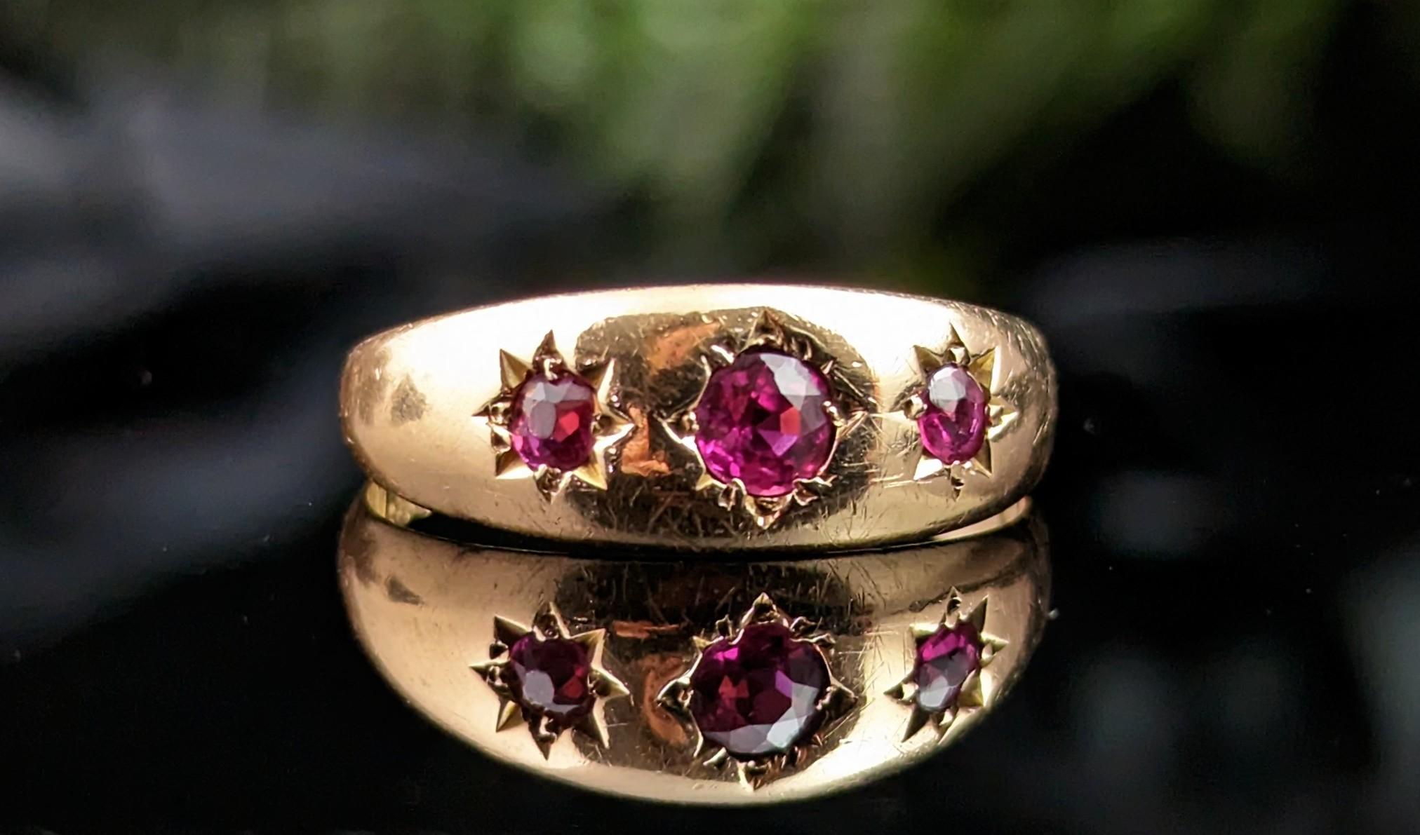 You can't help but be enamoured by this stunning antique, Victorian era, Ruby Gypsy set ring in 18kt yellow gold.

One of our favourite styles here at StolenAttic and a firm customer favourite.

This beautiful ring is a three stone, Gypsy set ring