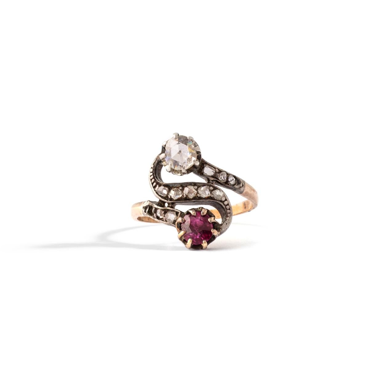 Antique Crossover Ruby natural non heated and Rose cut Diamond on silver and gold Ring.
Rose cut Diamond Diameter: Approximately 5.05 millimeters.
Round cut Ruby Diameter: Approximately 5.05 millimeters.
Ring Size: 6 1/4.
Gross weight: 3.12 grams