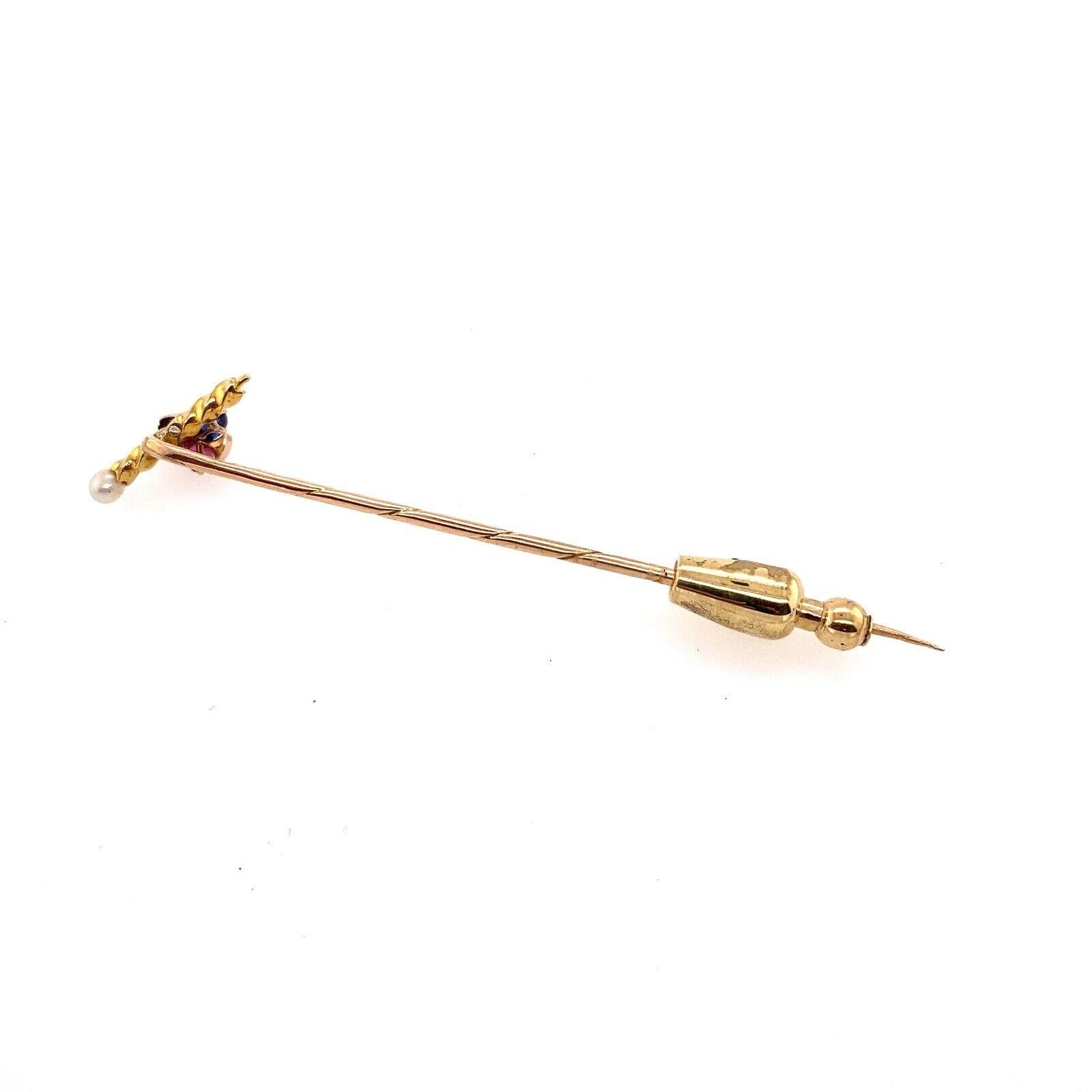 Antique 15ct Yellow Gold Stick Pin, Set With Ruby, Sapphire, Pearl & Diamond

This elegant Victorian cut Diamond 0.04ct stickpin in 15ct Yellow Gold set with a Ruby, Sapphire, Pearl and a Diamond. It's a timeless piece that can be kept in your