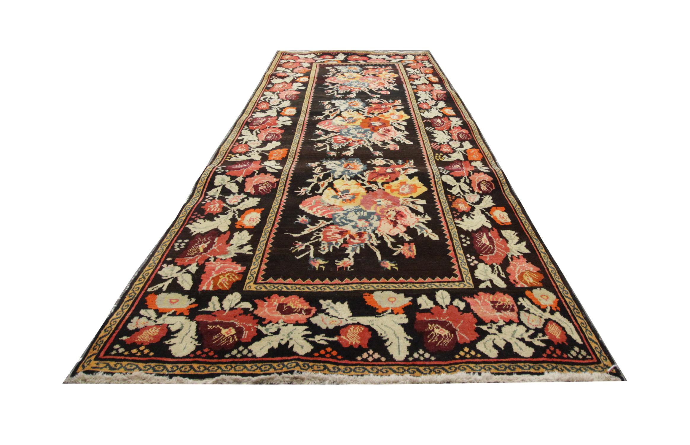 This colorful rug was handwoven and hand-dyed using traditional vegetable dye techniques in Karabagh. Using only the highest quality wool and cotton this handmade rug has light blue, orange, grey, white, pink and red colors in a pattern across the