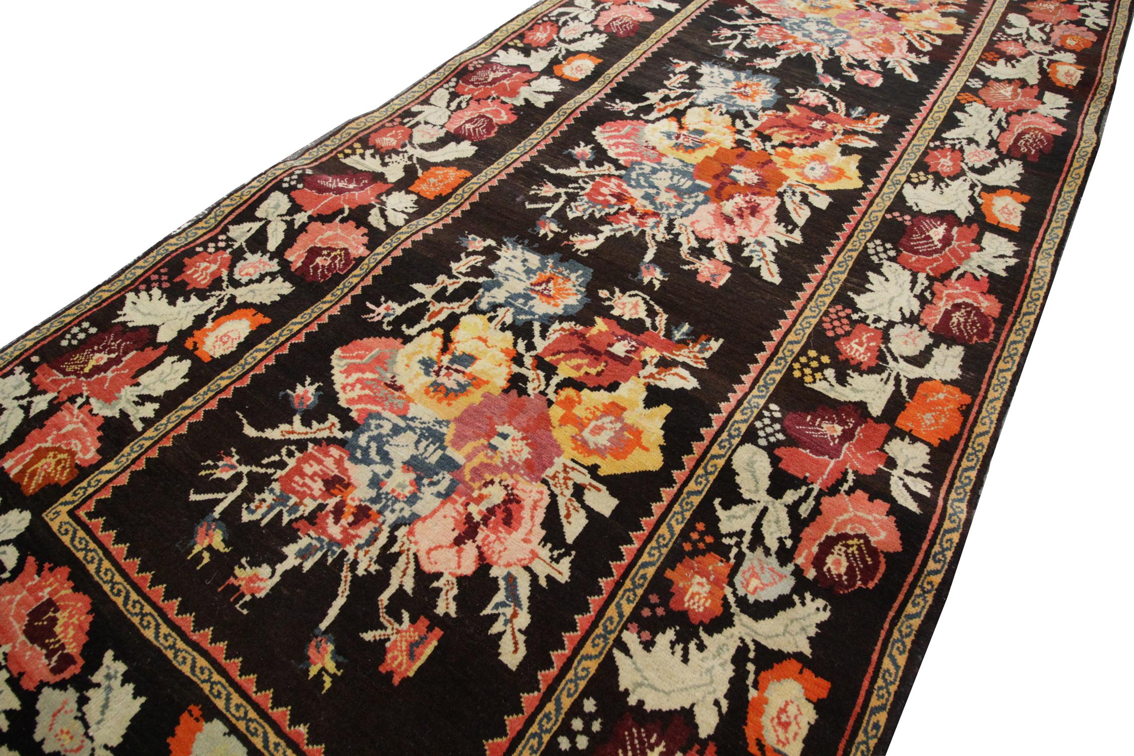 This colourful rug was handwoven and hand-dyed using traditional vegetable dye techniques in Karabagh. Using only the highest quality wool and cotton, this handmade rug has light blue, orange, grey, white, pink and red colours in a pattern across