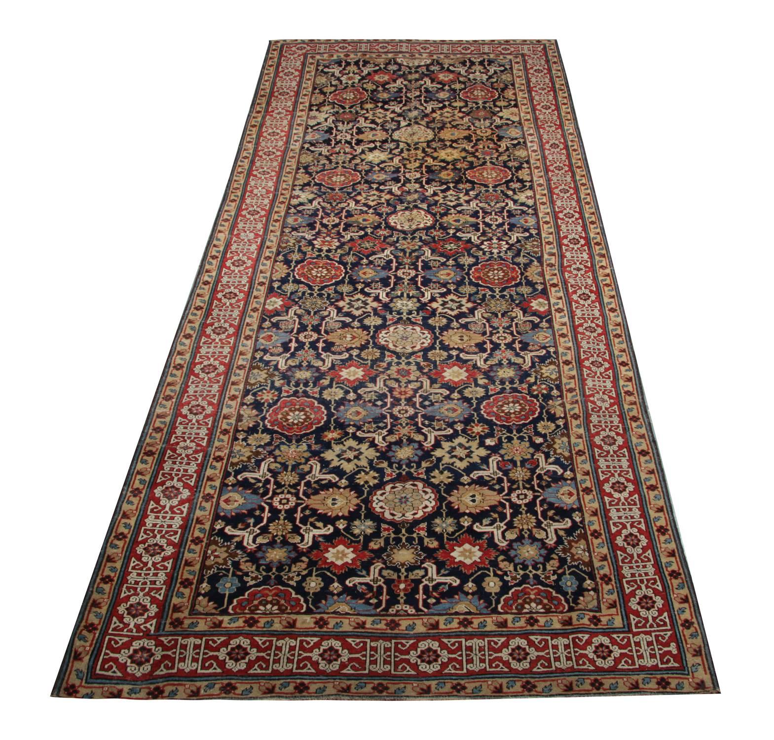 Oriental rug an exceptional example of Kuba all-over patterned rugs. This geometric antique rug is in excellent condition, circa 1870s. These large rugs are from Kuba, which is a part of the Caucasian area. This floral rug has a lot of contrasting
