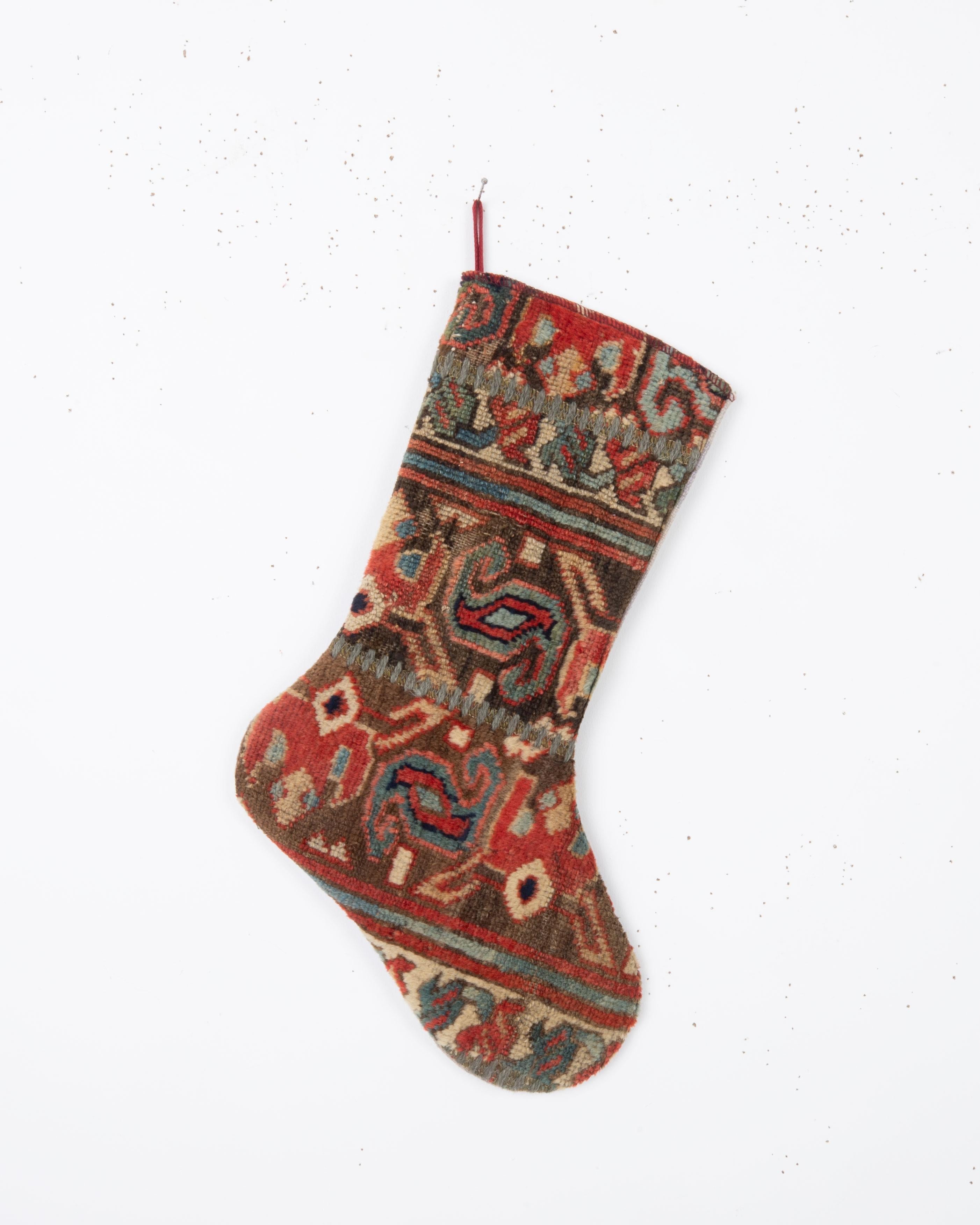 Each piece is one-of-a-kind, celebrating the artistry of traditional weaving while being repurposed into a festive and 
functional heirloom. Perfect for hanging by the fireplace, gifting, or adding a touch of vintage character to your seasonal