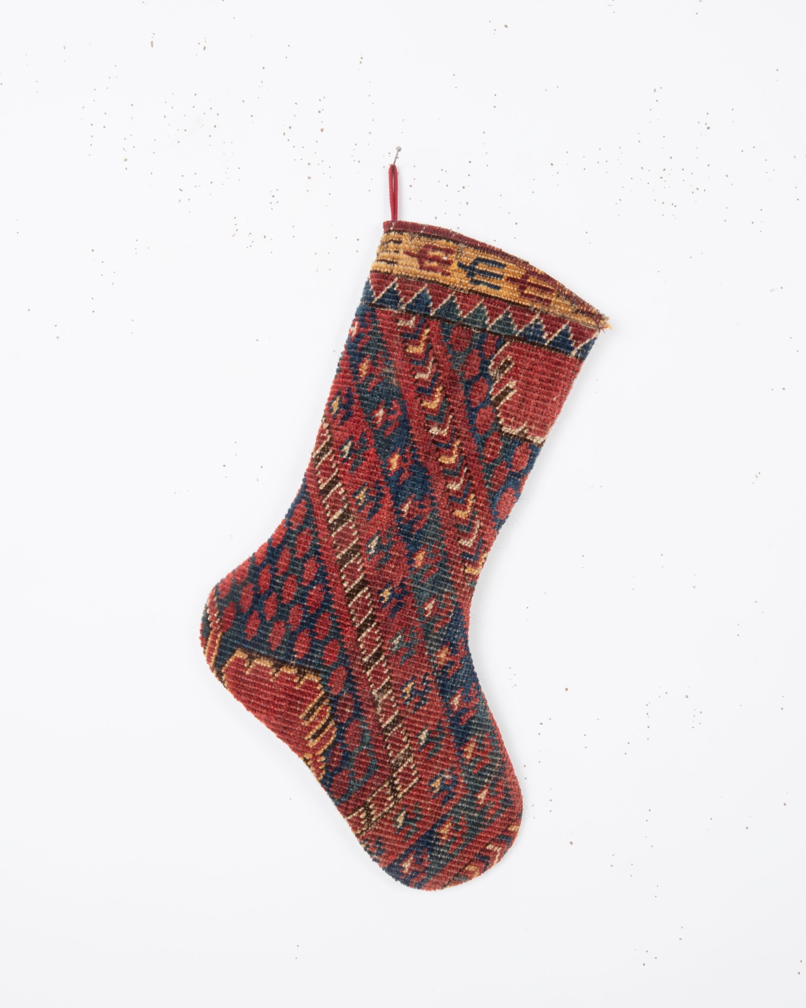 Each piece is one-of-a-kind, celebrating the artistry of traditional weaving while being repurposed into a festive and 
functional heirloom. Perfect for hanging by the fireplace, gifting, or adding a touch of vintage character to your seasonal