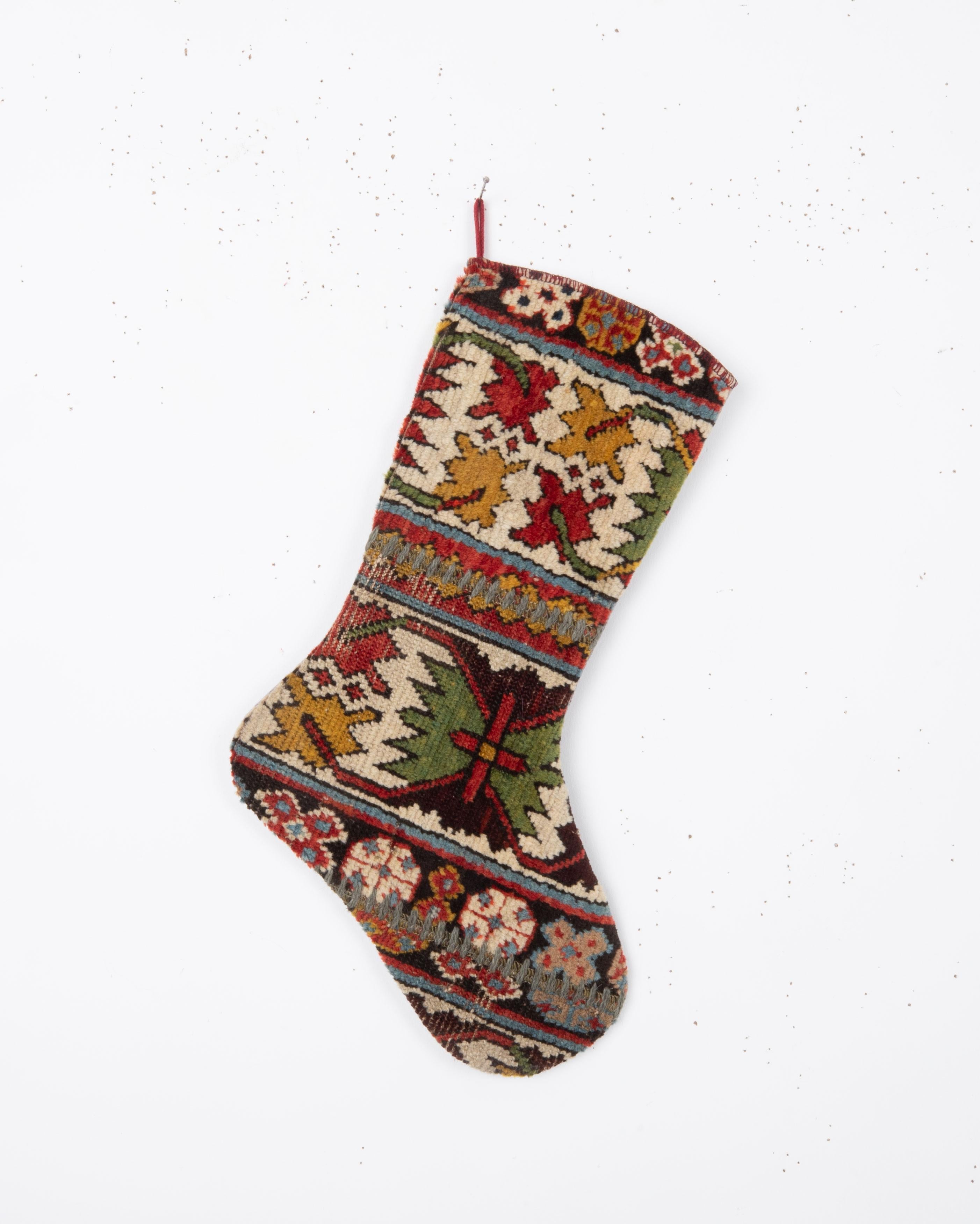 Each piece is one-of-a-kind, celebrating the artistry of traditional weaving while being repurposed into a festive and 
functional heirloom. Perfect for hanging by the fireplace, gifting, or adding a touch of vintage character to your seasonal