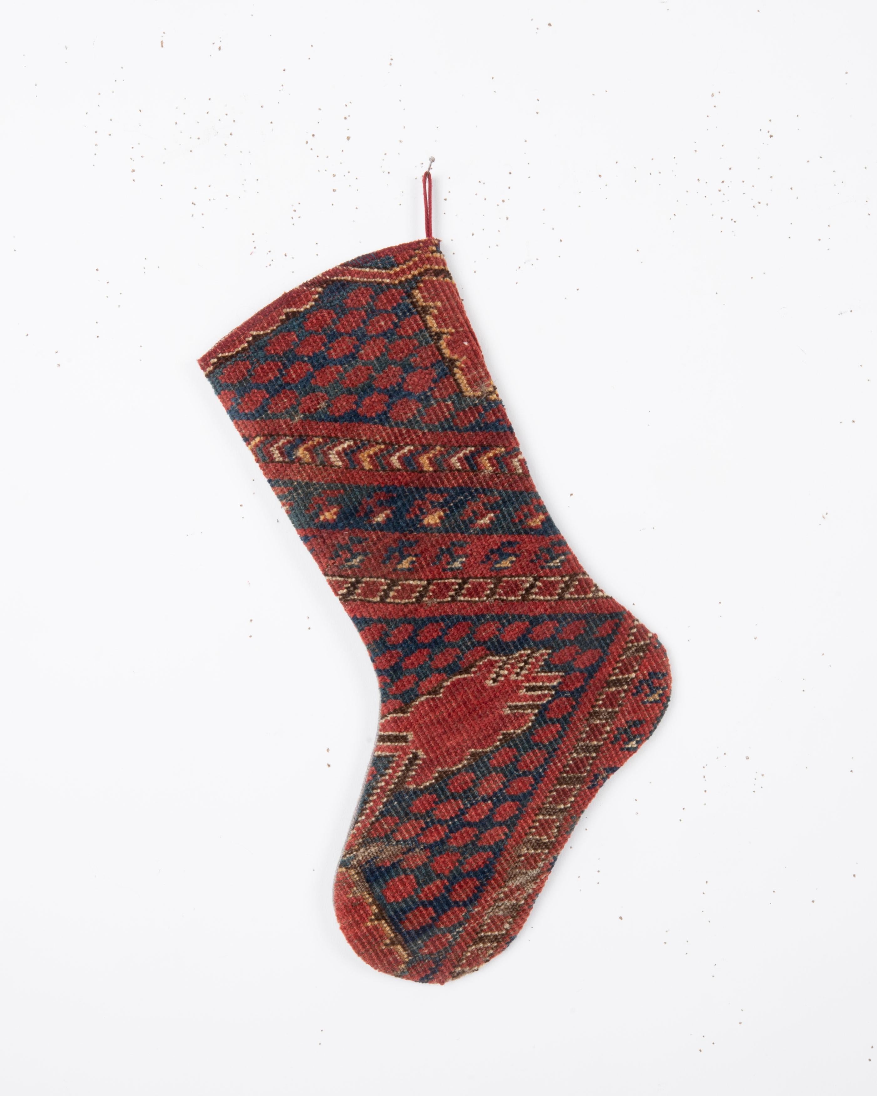 Each piece is one-of-a-kind, celebrating the artistry of traditional weaving while being repurposed into a festive and 
functional heirloom. Perfect for hanging by the fireplace, gifting, or adding a touch of vintage character to your seasonal