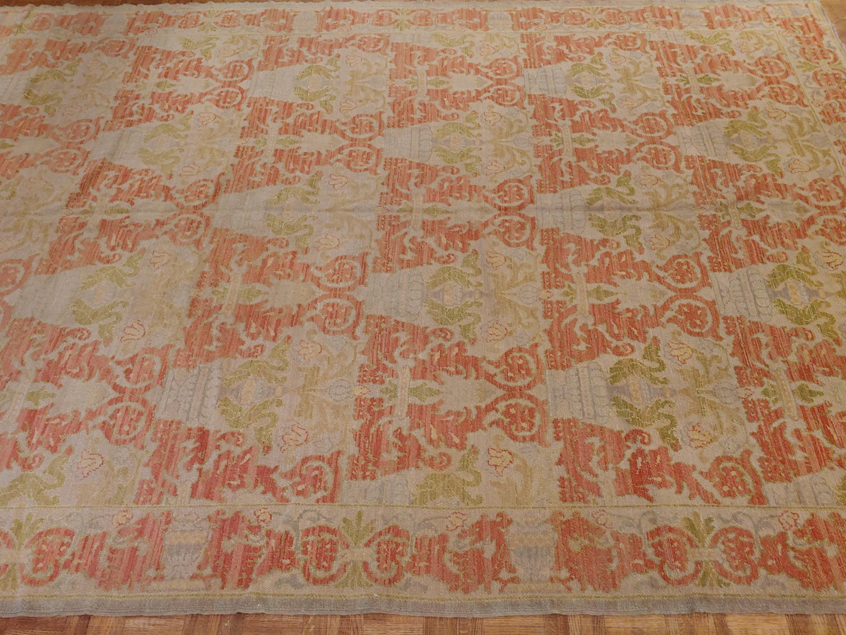 Spanish Colonial Antique Rug from Spain, Palmettos on Rust Field, Wool, 1900 For Sale