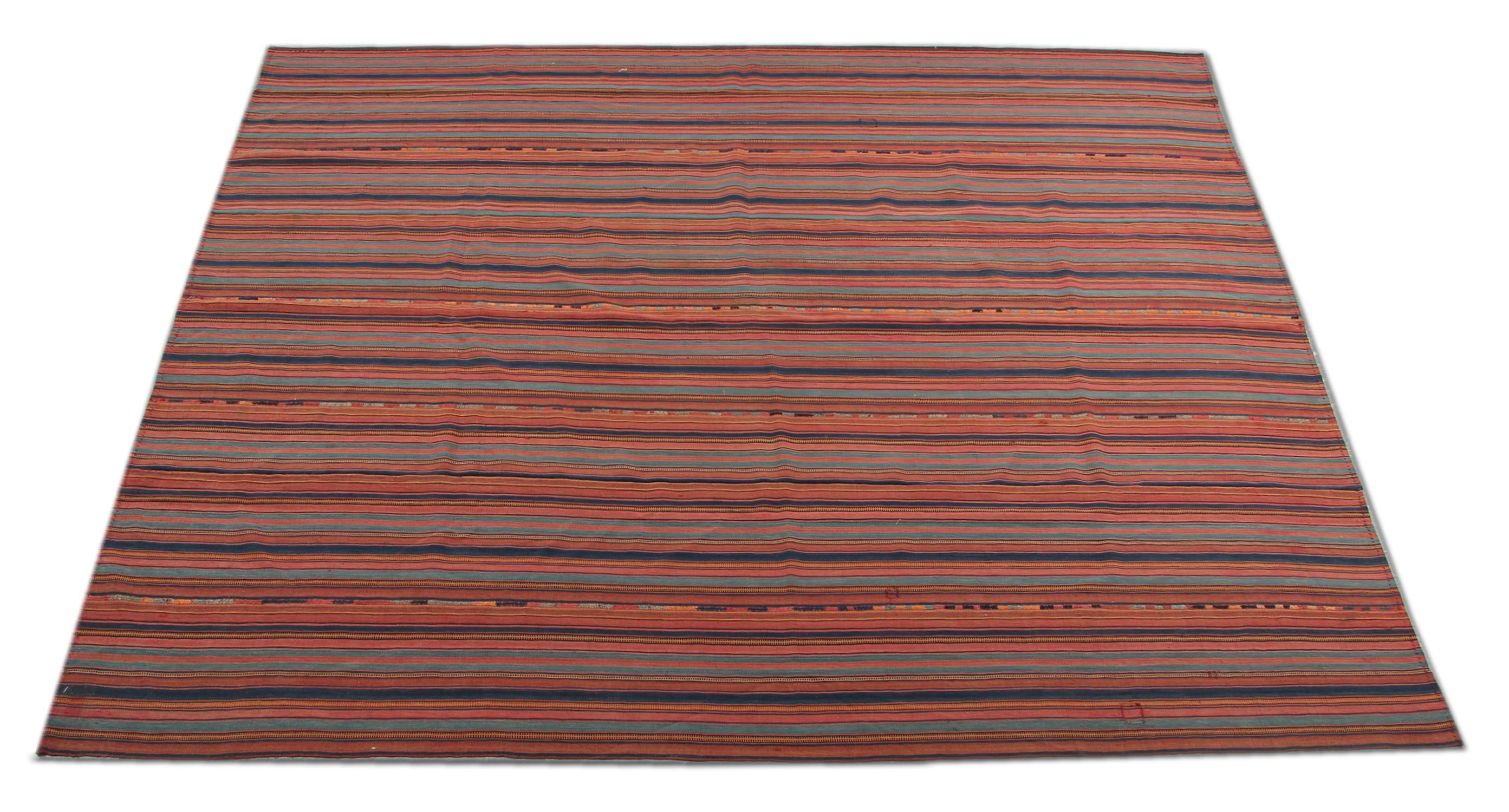 Red, rust, blue and orange make up the main colors in this fantastic handwoven Jajim. Featuring a simple, traditional stripe design, both the color and the design in this piece make it the perfect accent piece.
Constructed with fine, hand-spun wool