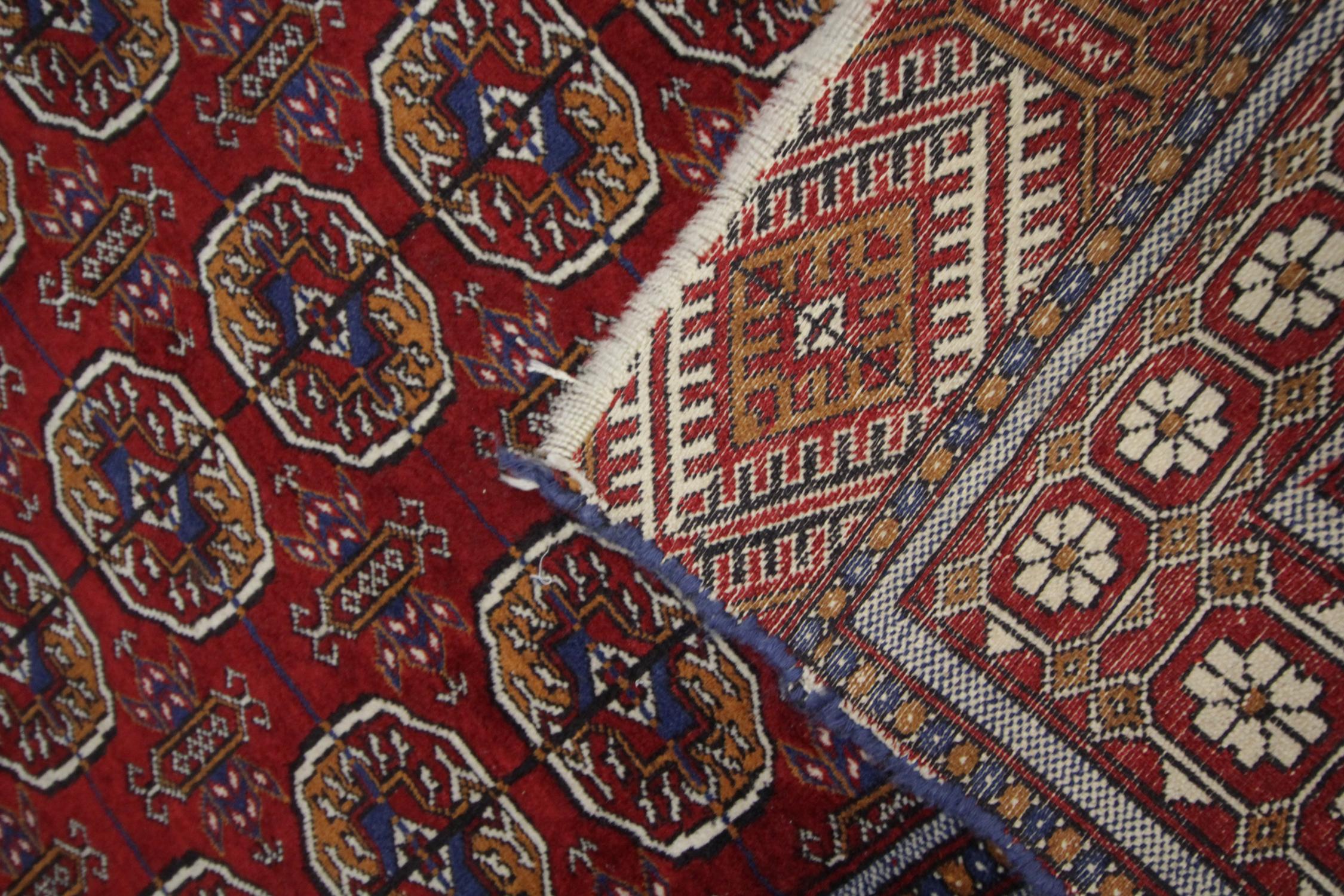 Antique Rugs Bukhara Area Rug Handwoven Red Wool Oriental Carpet In Excellent Condition For Sale In Hampshire, GB