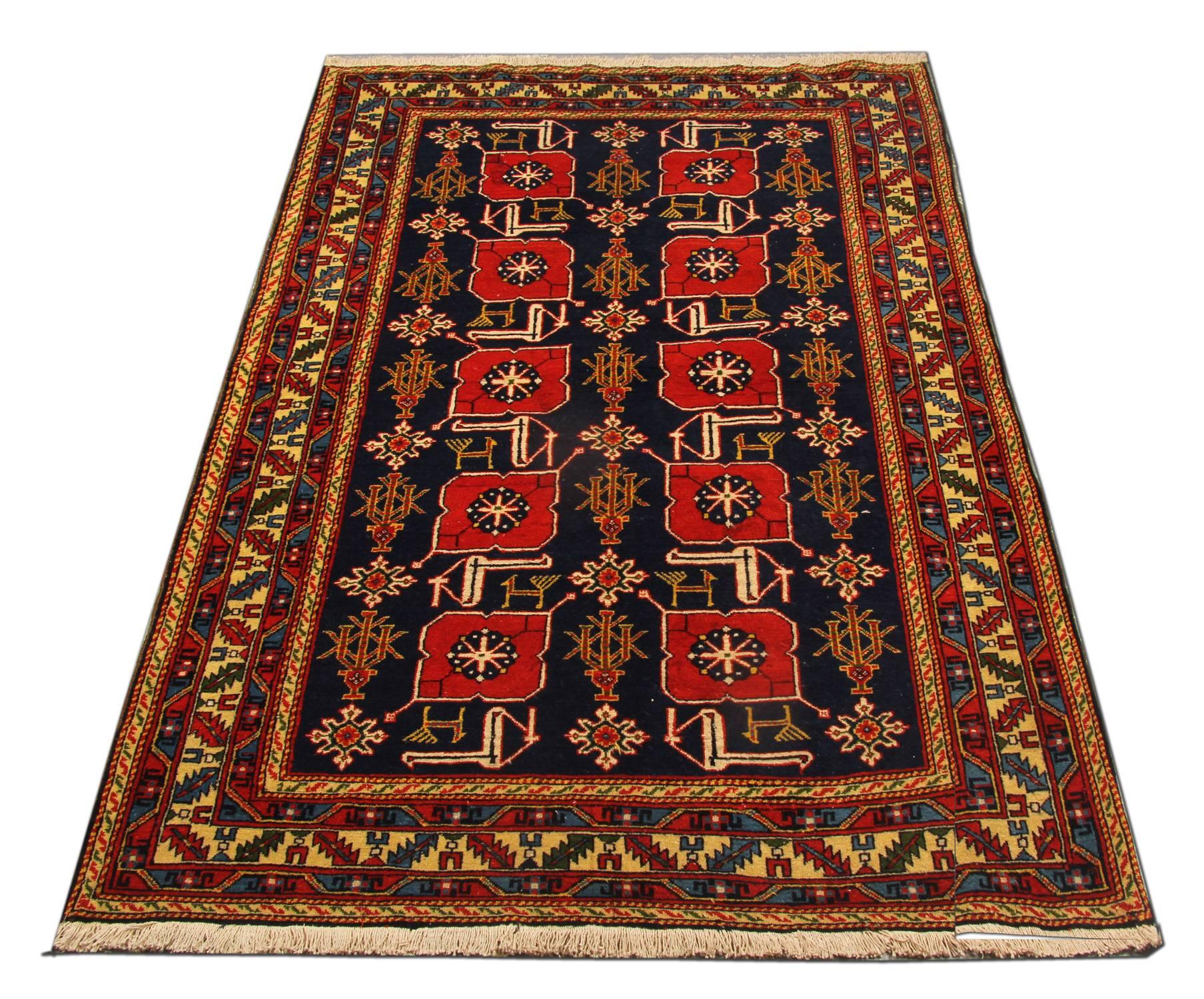 This red rug is a rare antique Caucasian-designed Armenian Karabagh. This tribal rug is a one-of-a-kind treasure in the weaving world. The geometric rug design name is Karaghashli. Luxury rugs as this antique piece of art would complement and give