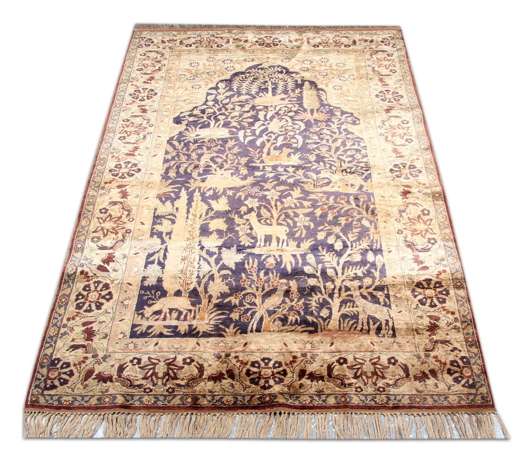 A finely hand knotted vintage Central Anatolian golden purple rug with a Classic all-over paradise design of small patterns. The high-quality wool pile on strong silk foundation of this gold rug and excellent original condition let this floral rug