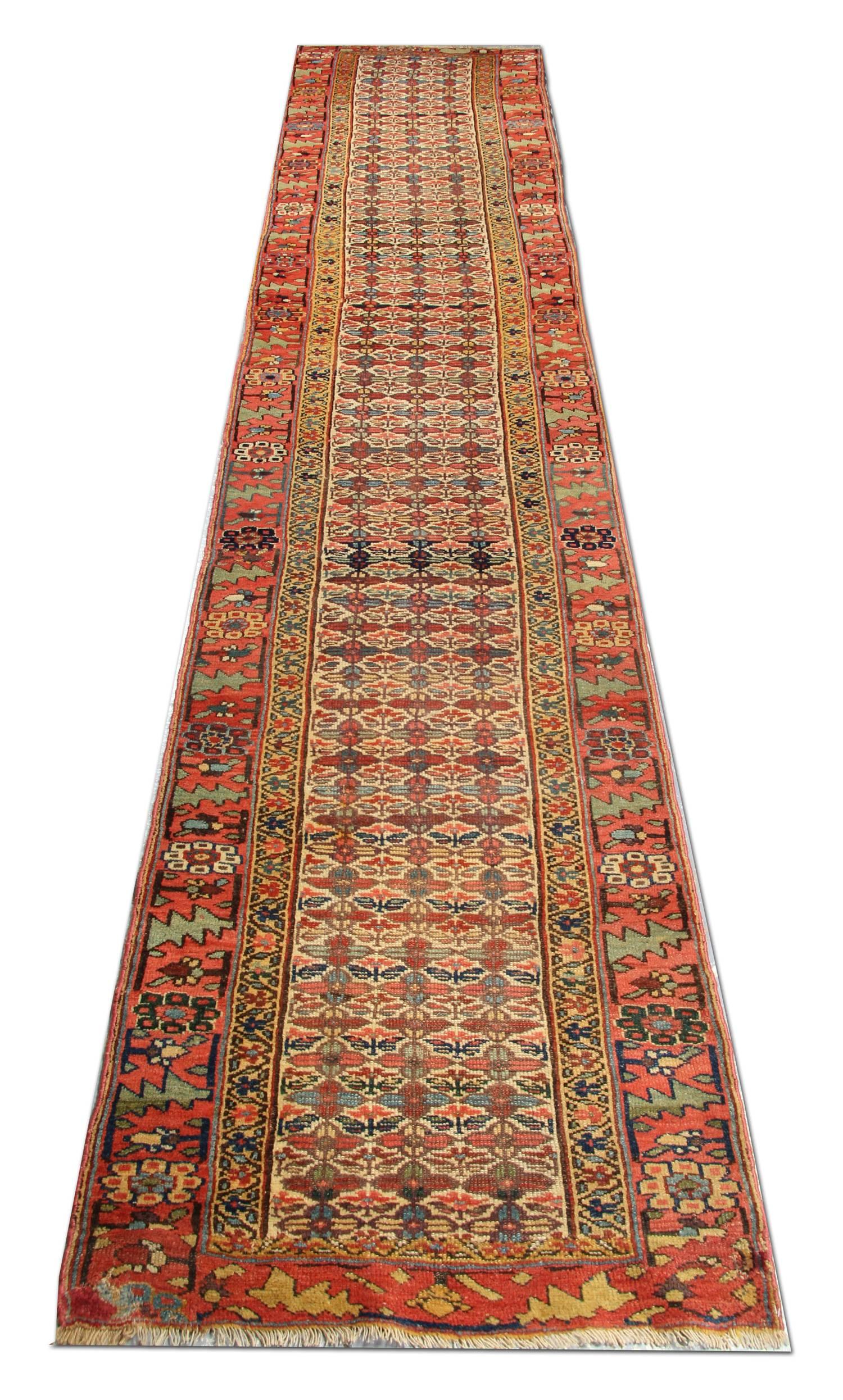 These beautiful antique Shirvan rugs and runners have been woven in the mountainous region of Caucasus and dates from the second half of the 19th century. The floral rug displays an all-over geometric rug design of repeat diamond shapes in multiple
