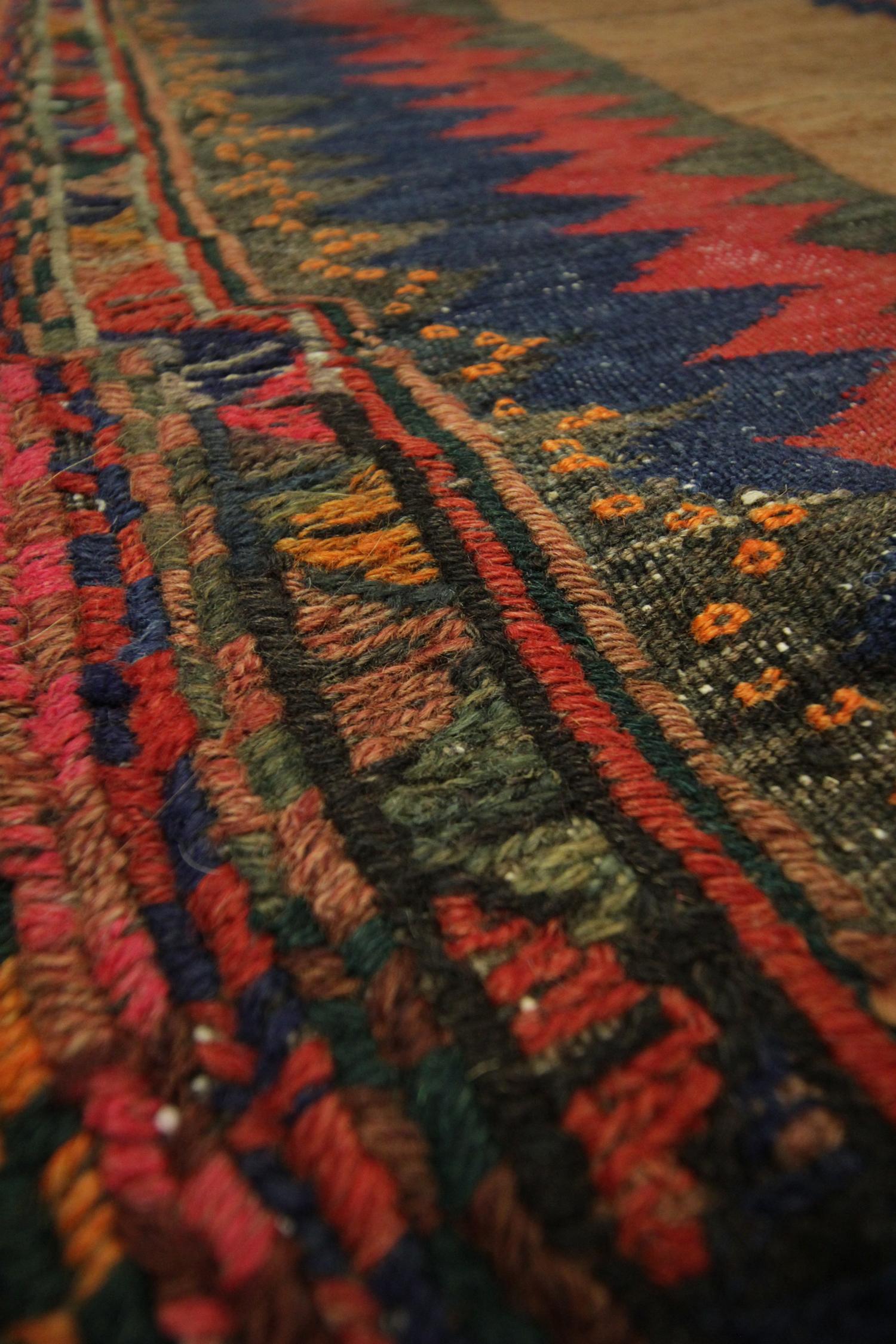 threadbare kilim rug