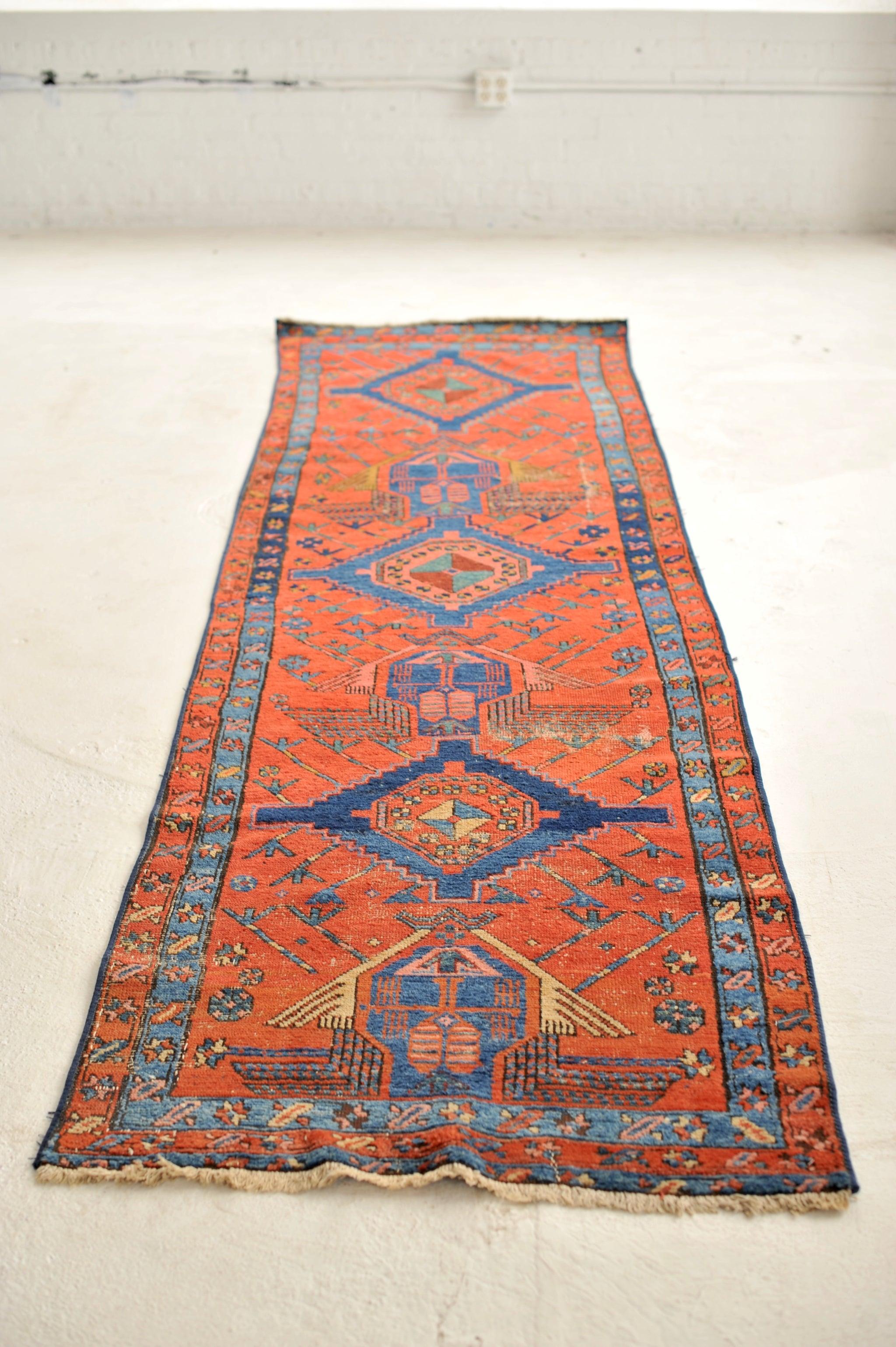 Beautiful Fruit Punch & Ice Blue  Incredible Geometric Tribal Design

About: Incredible piece, very handsome.

Size: 3 x 10.8
Age: Antique with an ancient area of minor responsible restoration - age-related patina.

This rug is one-of-a-kind, only