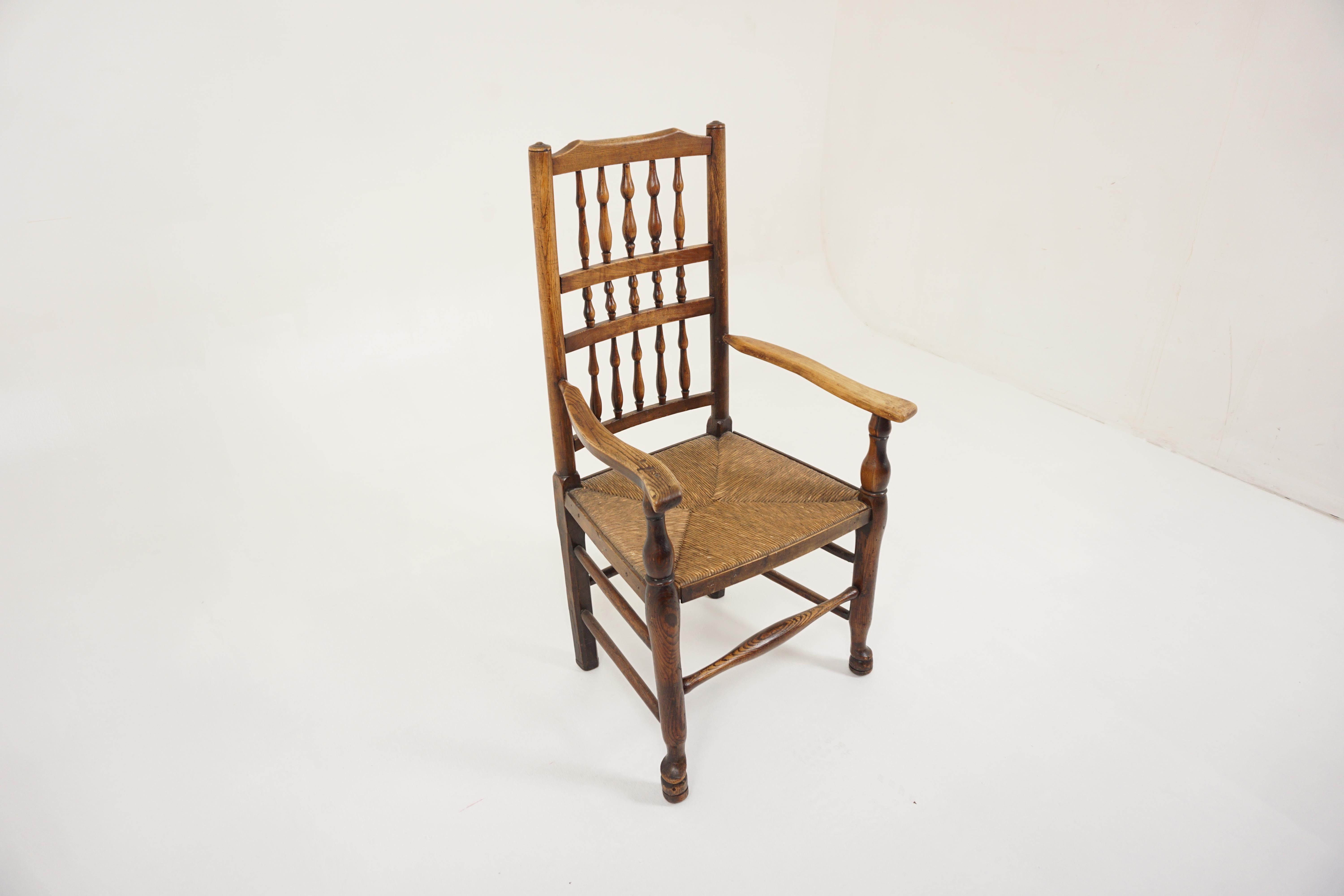 Antique Rush Seated Elm Lancashire Spindle Back Arm Chair, England 1900, H942 In Good Condition In Vancouver, BC