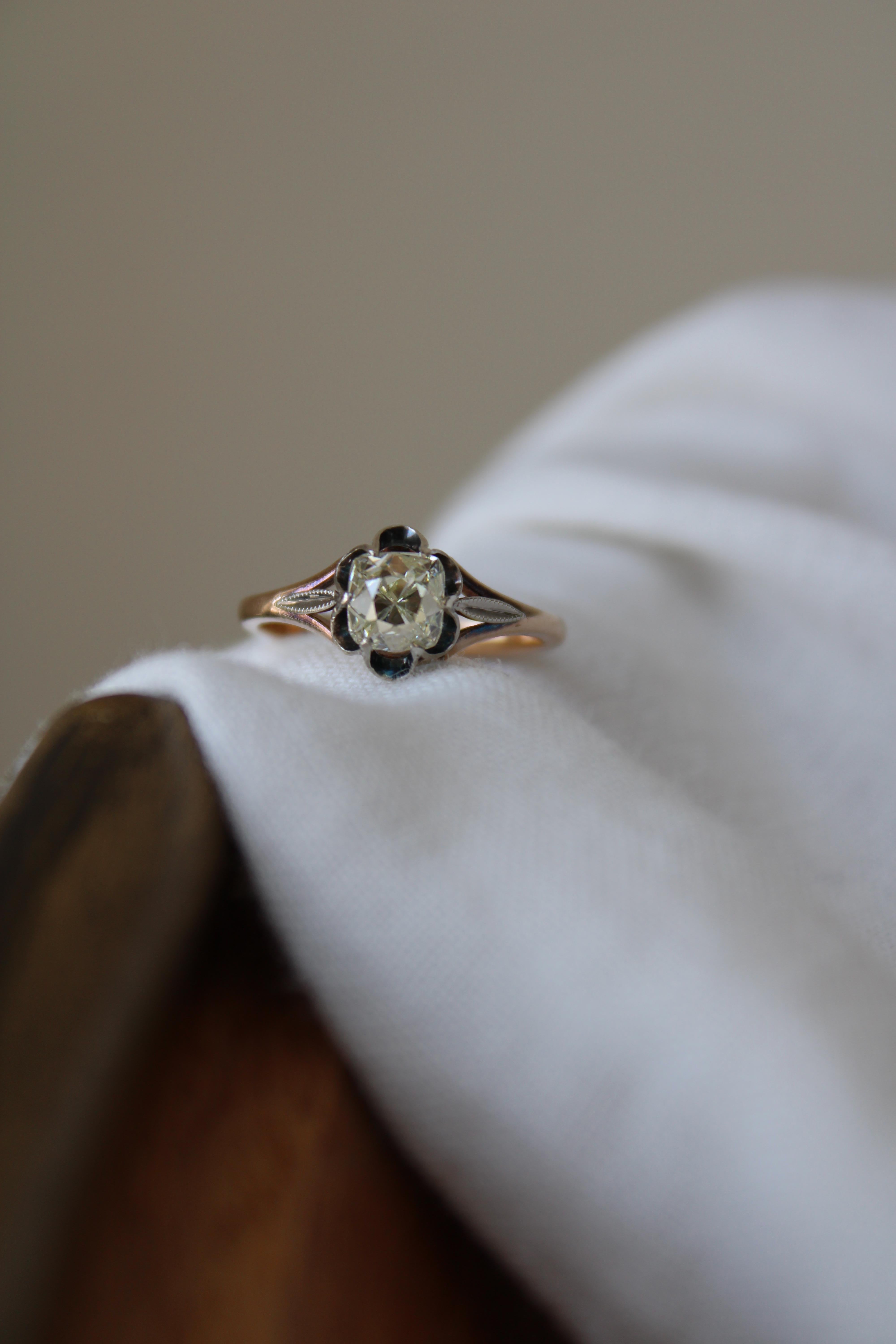This is one incredible ring. 
It finds its origins in Soviet Russia, centered with a 1700s certified Peruzzi Cut diamond, set a bit later in its life within a two-tone Victorian Setting.

A little more about the stone. A Peruzzi cut diamond is a