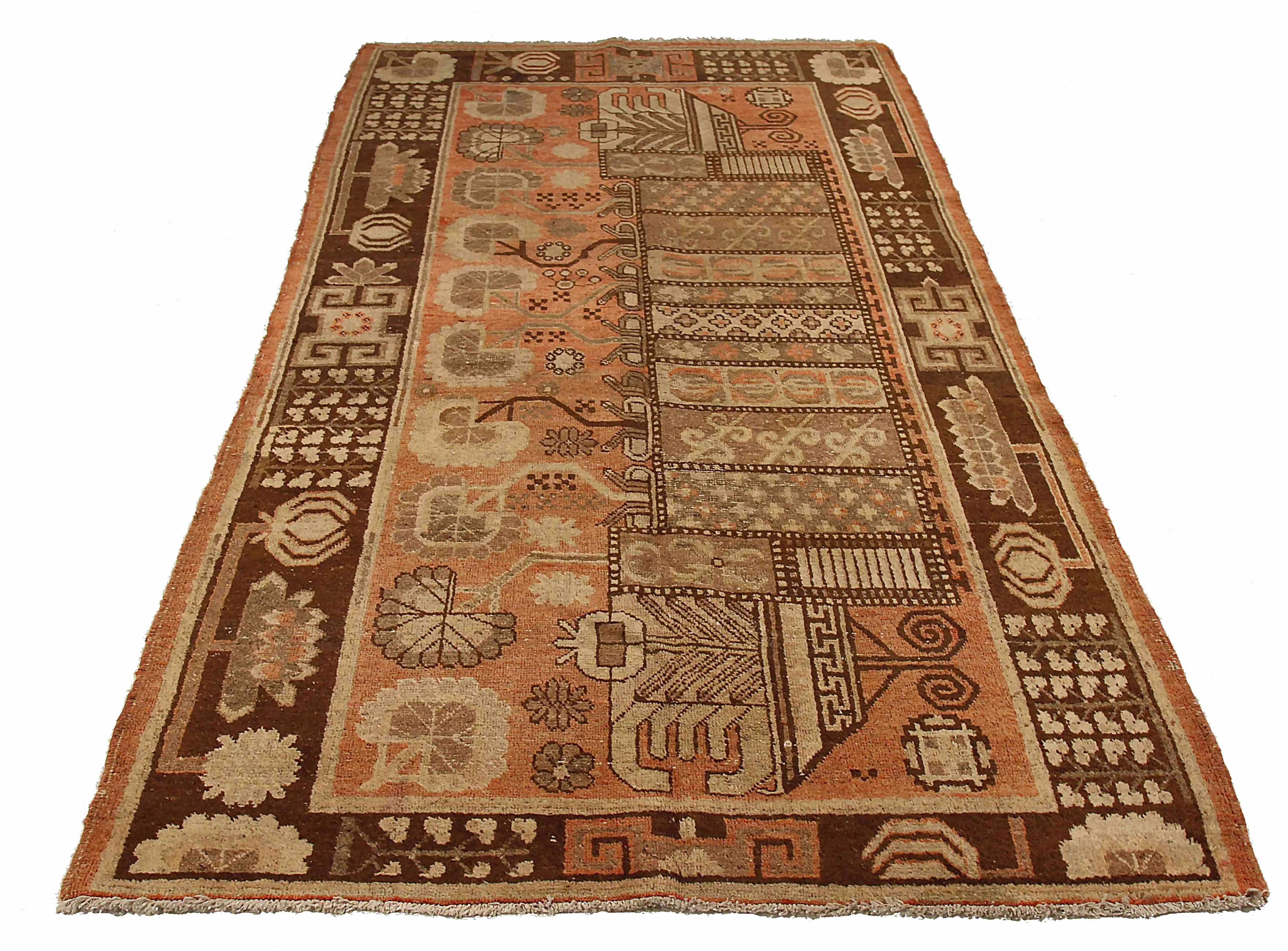 Antique Russian area rug handwoven from the finest sheep’s wool. It’s colored with all-natural vegetable dyes that are safe for humans and pets. It’s a traditional Khotan design handwoven by expert artisans. It’s a lovely area rug that can be