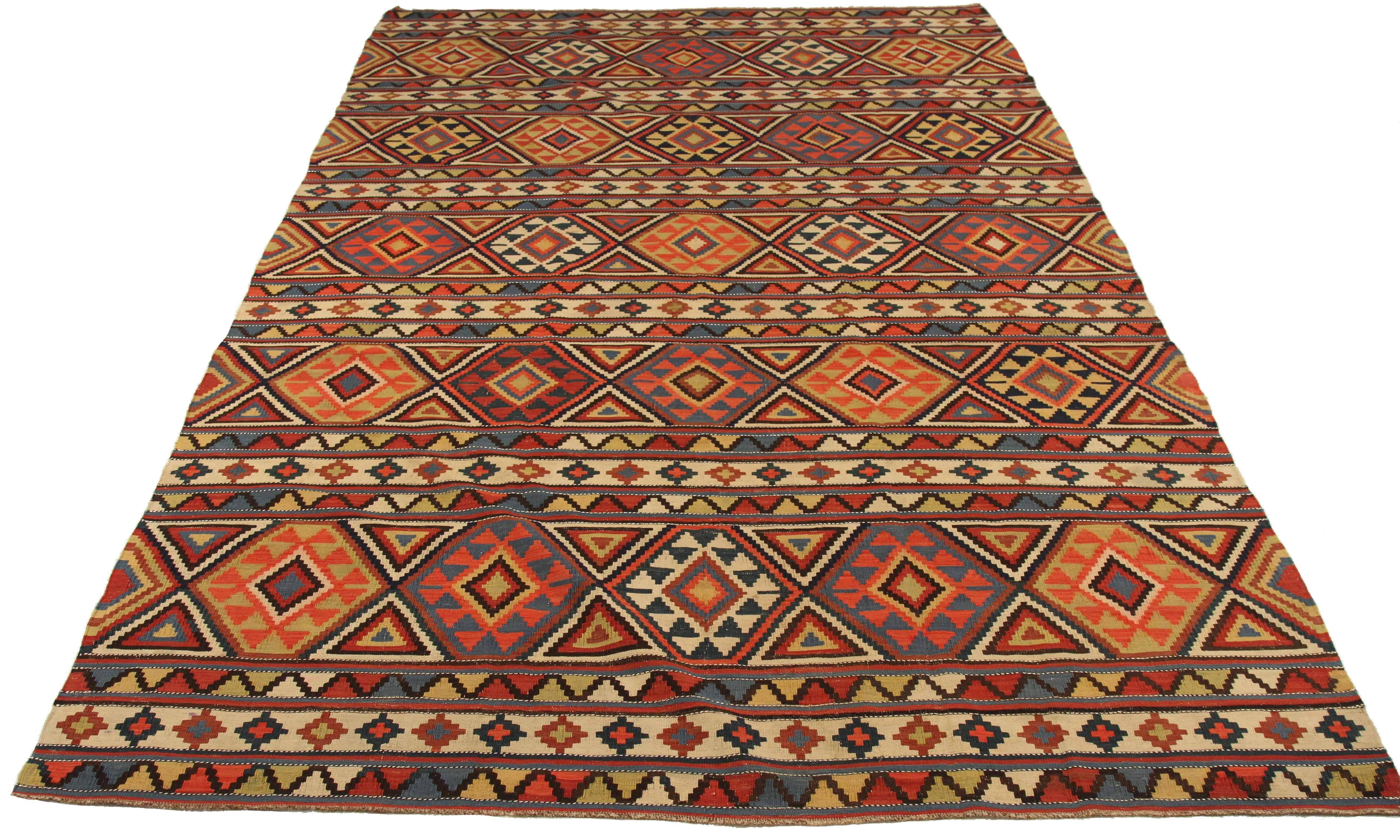 Antique Russian area rug handwoven from the finest sheep’s wool. It’s colored with all-natural vegetable dyes that are safe for humans and pets. It’s a traditional Kilim design handwoven by expert artisans. It’s a lovely area rug that can be