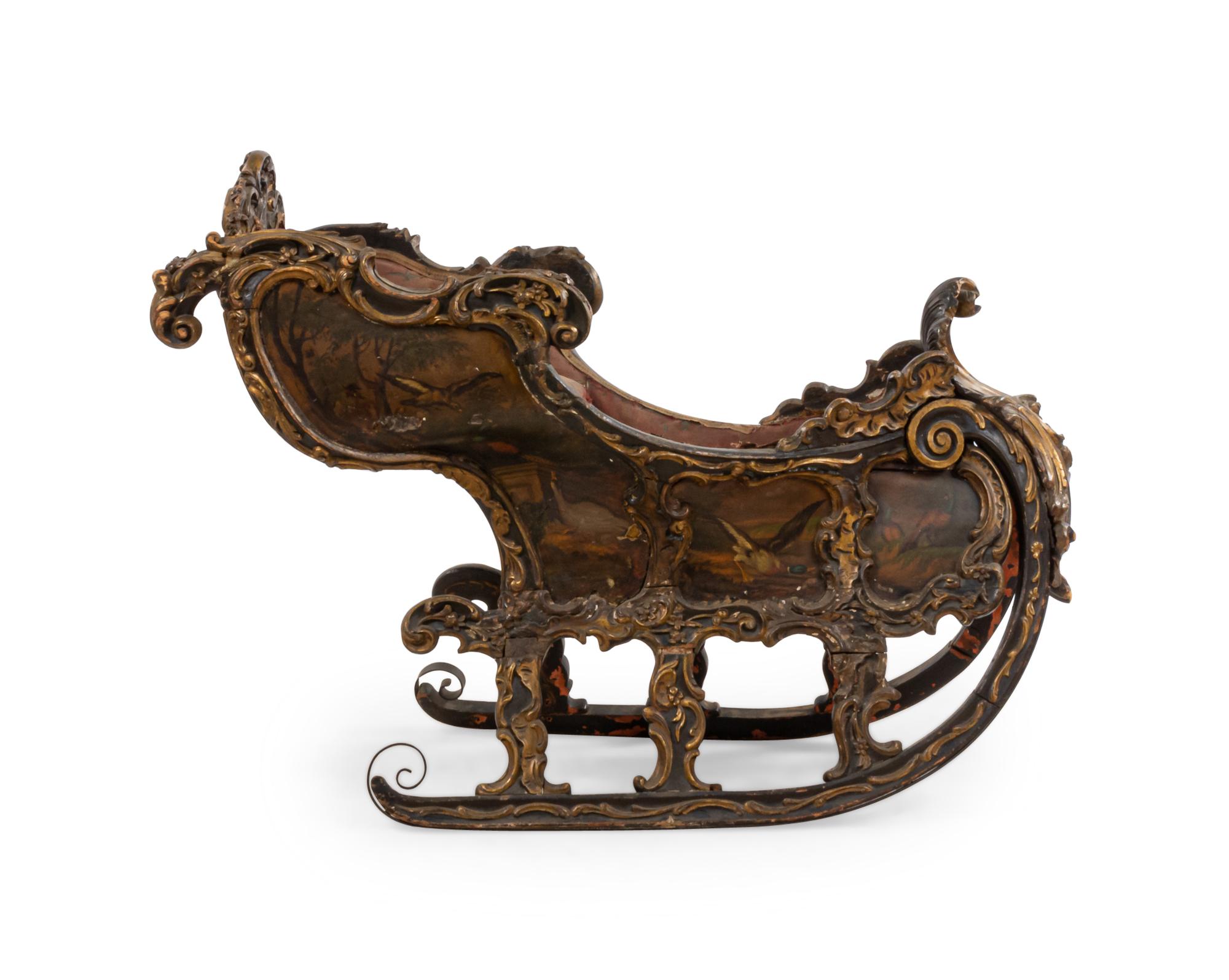 Russian (18/19th Cent) ornately painted and carved sleigh with carved shell front sleigh
