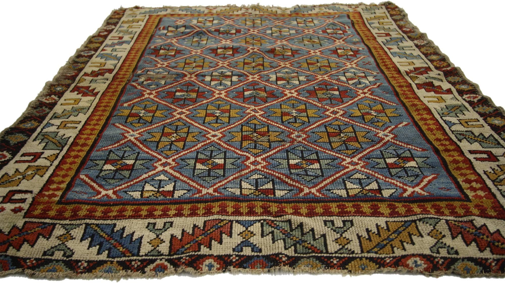 77146 Antique Russian Caucasian Shirvan Rug with Diamond Lattice 03'04 x 04'00. With its perfectly worn-in charm, pop of color and edgy elements, this antique Caucasian Shirvan rug will create a warm, lived-in look and take on a curated look that