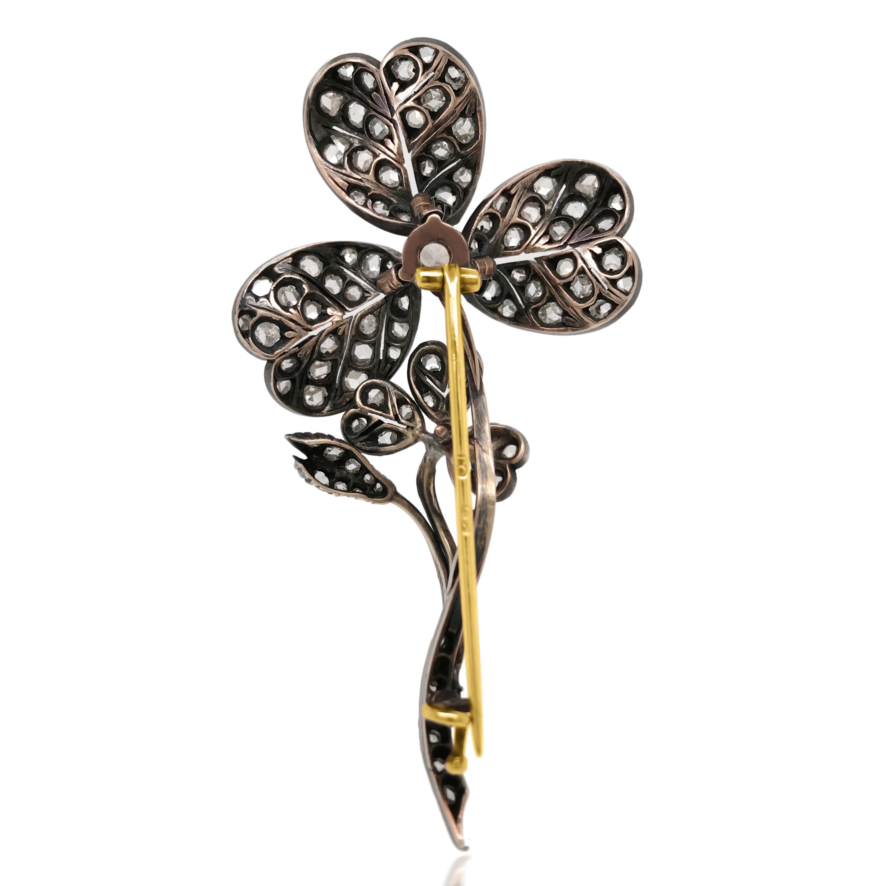 This magnificent Victorian clover brooch of immaculate craftsmanship is crafted in silver-gilt and exposes 3 clovers with old rose cut diamonds, weighing cumulatively approx. 3.5ct.

Diamond total weight: 3.5ct
Weight: 13.58 grams 
Measurement: