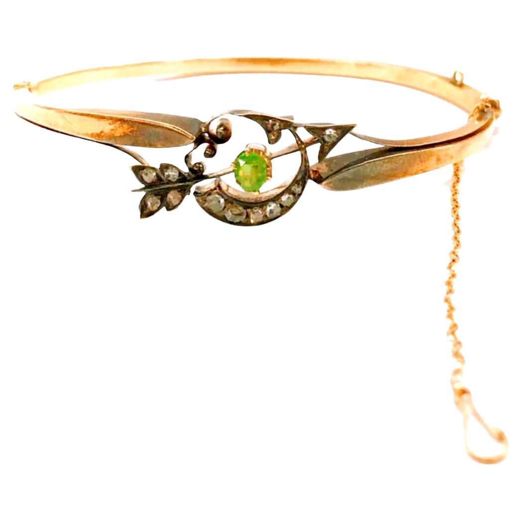 Antique Russian 14k gold bracelet in crescent and arrow design centered with 1 demantoid green stone and rose cut diamonds hall marked 56 imperial Russian gold standard 14k gold and  assay mark 