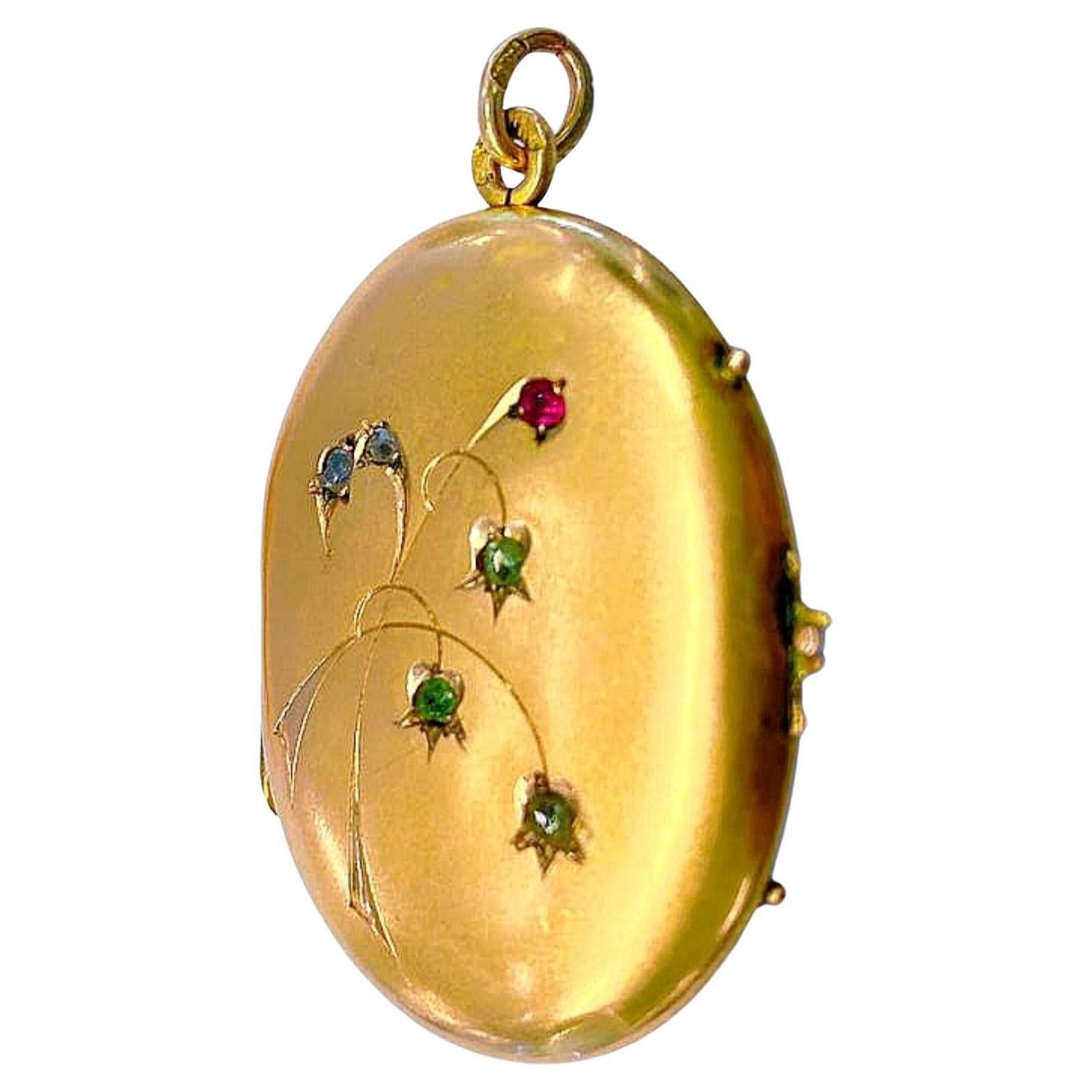 Antike 14k Gold russische Medaillon Anhänger graviert auf der Vorderseite mit Jugendstil Blume mit grünen Demantoid Steinen und Rose geschliffenen Diamanten und Rubin Anhänger ist Halle markiert 56 kaiserlichen russischen Gold-Standard und erste