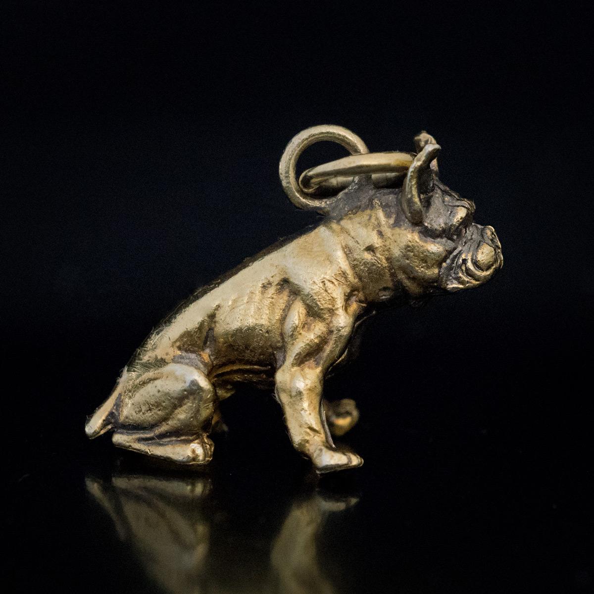 Circa 1870

An antique Russian gilded silver charm is finely modeled as a seated boxer dog. The charm is marked on suspension ring with 84 zolotnik Imperial silver standard.

Height 19 mm (2/3 in.)

Width 21 mm (7/8 in.)