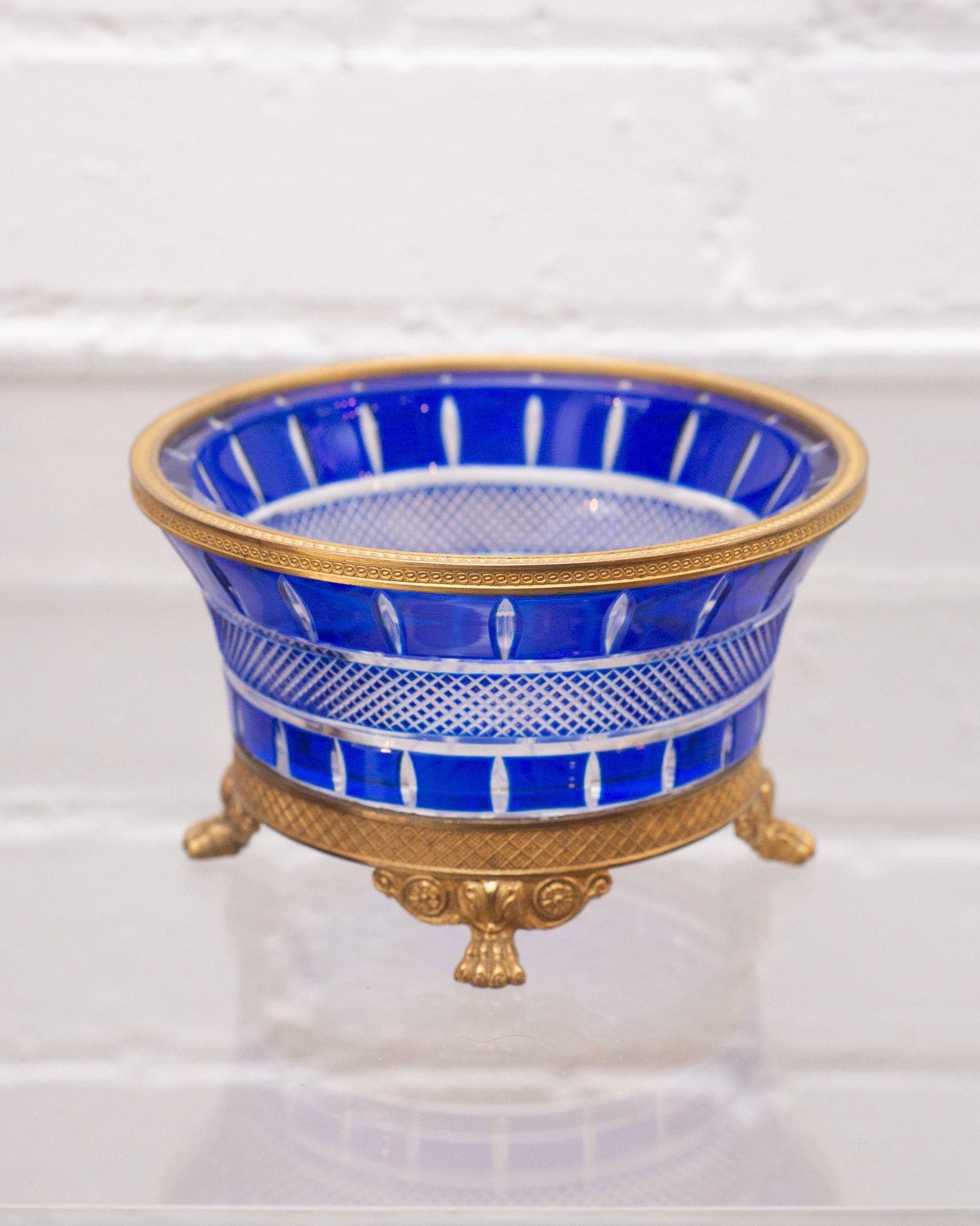 An ornate Russian Imperial cobalt blue and clear cut crystal bowl, circa 1890, with bronze mount. This elaborate handcut crystal catches the light beautifully.