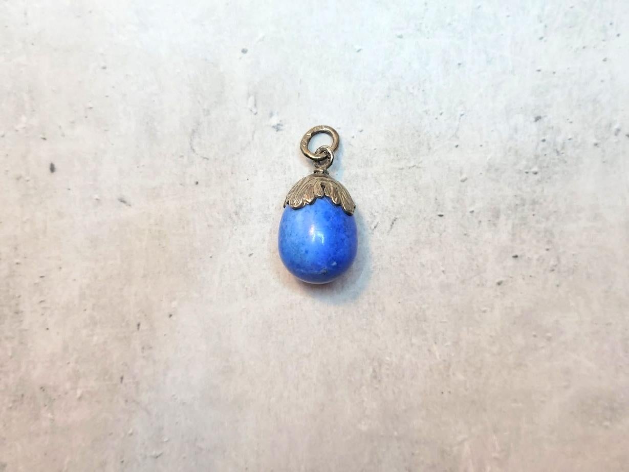Another unique item from our collection is a simple yet charming silver egg pendant with lapis lazuli, crafted in Imperial Russia by master Alfred Thielemann.

The pendant measures 26.7 mm long and 15.4 mm wide (1 x 0.6 in).
The weight is 9